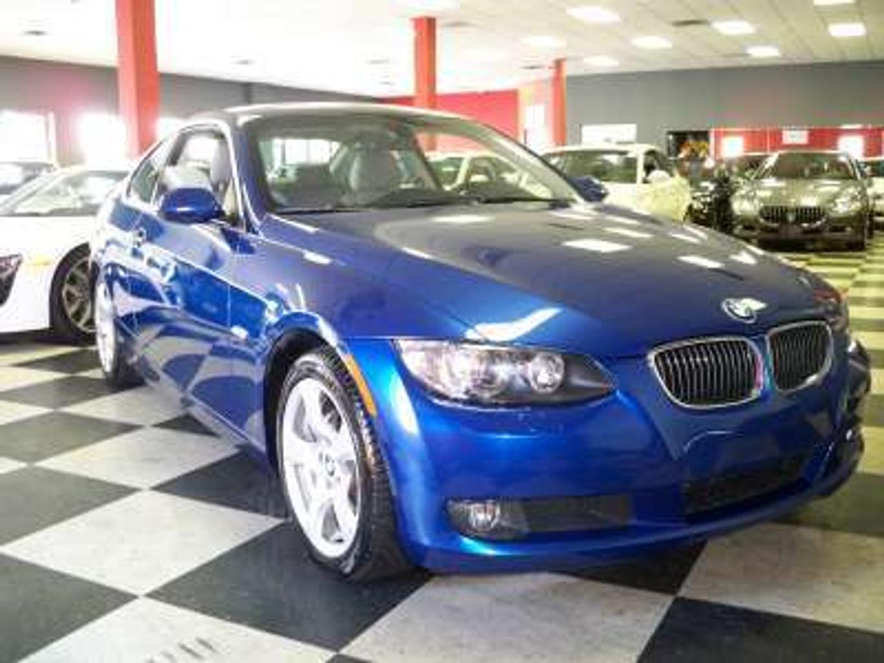This 2007 BMW 328i XDrive Coupe, features a 6 Cylinder engine. The vehicle is Montego Blue with Grey Leather interior. It is Equipped with Navigation Pkg,6 Speed Steptronic Automatic Transmission,Xenon Lights, Sport Wheels, Power Steering,Fog Lamps,Heated Seats,Heated Mirrors 2 Keys,CarProof avail and Lots More... .Please Call or E-mail For More Info 1-888-616-7624 www.luxuryandsport.ca