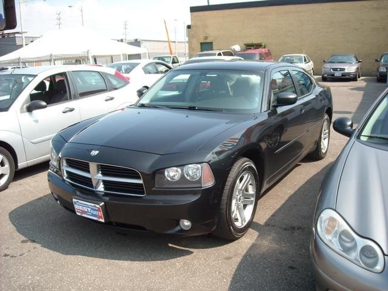 $55/Weekly for 60 months with $0 down

This beautiful bold black 2007 Dodge Charger SXT with Sunroof is sure to turn heads when it pulls into a parking lot. Between the roar of the 3.5 liter engine and the gray interior the 2007 Dodge Charger is for those people who want a big body car and a fun driving experience. You cannot have a big car without ABS and traction control to keep the car stuck to the road. Also equipped on this vehicle is the ability to connect to your cell phone device for hands free talking, a CD player that can read mp3 files, and a very comfortable driver???s seat. There are very few cars on the market that give you a quality ride inside and outside of the car complete this bargain.Dont miss out on this exceptional buy!!! <br><br>------------------------------------------------------------------------------------------------------------ <br>To get this great price and a free exclusive gift from SAM on your purchase, you must print out this ad and bring it to have it signed <br><br>Discount # _______________________ <br><br>X_______________________________ <br>Sams Signature
