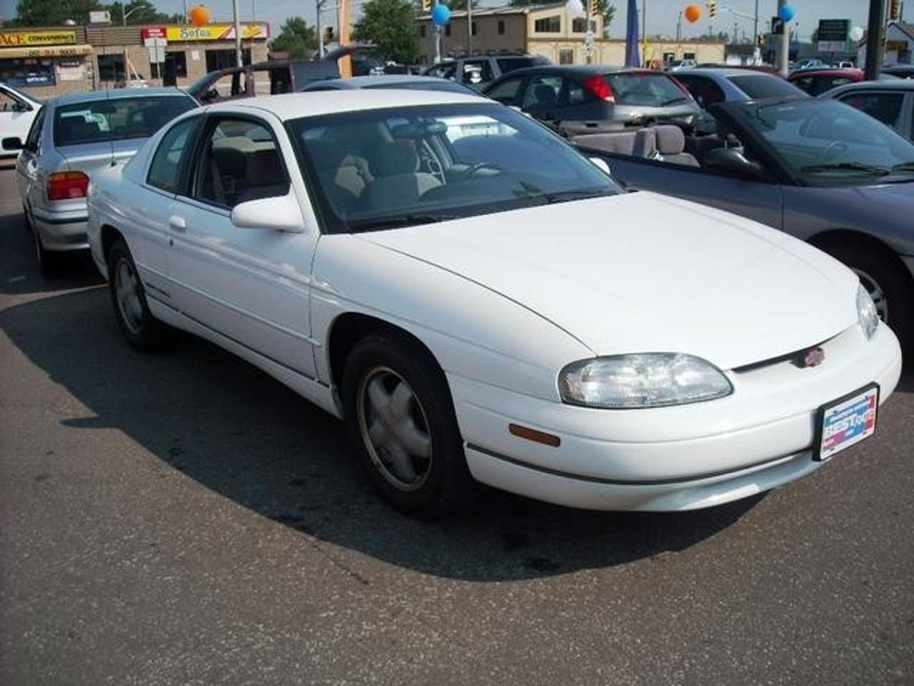 Features Overview <br>??? 4-Speed A/T <br>??? 4-Wheel ABS <br>??? A/C <br>??? A/T <br>??? Adjustable Steering Wheel <br>??? Aluminum Wheels <br>??? AM/FM Stereo <br>??? Cruise Control <br>??? Driver Air Bag <br>??? Driver Vanity Mirror <br>??? Front Disc/Rear Drum Brakes <br>??? Front Floor Mats <br>??? Front Reading Lamps <br>??? Front Wheel Drive <br>??? Gasoline Fuel <br>??? Intermittent Wipers <br>??? Keyless Entry <br>??? Pass-Through Rear Seat <br>??? Passenger Air Bag <br>??? Passenger Illuminated Visor Mirror <br>??? Passenger Vanity Mirror <br>??? Power Door Locks <br>??? Power Driver Mirror <br>??? Power Passenger Mirror <br>??? Power Steering <br>??? Power Windows <br>??? Rear Floor Mats <br>??? Remote Trunk Release <br>??? Tires - Front All-Season <br>??? Tires - Rear All-Season <br>??? V6 Cylinder Engine <br>??? Vehicle Anti-Theft System <br><br><br><br>Detailed Interior Features <br>??? * Deluxe trunk decor with cargo convenience net <br>??? * Electronic speed control with resume speed <br>??? * Power trunk opener <br>??? * Remote keyless entry <br>??? Auxiliary lighting <br>??? Color-keyed front/rear carpeted floor mats <br>??? Day/night rearview mirror with integral reading lamps <br>??? Interior lighting with sustained illumination <br>??? LH visor mirror/RH illuminated visor mirror <br>??? Low engine oil level sensor <br>??? PASS-Key II theft deterrent system <br>??? Power door locks <br>??? Power windows with driver-side express down <br>??? Scotchgard fabric protector inc: seats / door trim / floor covering <br>??? Tachometer <br>??? Tilt-wheel adjustable steering column <br>??? Trip odometer <br><br><br><br>Detailed Exterior Features <br>??? * Black chrome molding around lower body <br>??? * Dual remote electric mirrors <br>??? * Front/rear sport bumpers <br>??? Base coat/clear coat paint <br>??? Body-color door handles <br>??? Body-side moldings <br>??? Bright chrome grille <br>??? Intermittent windshield wipers <br>??? Lower body accent <br>??? Tinted glass <br><br><br><br>Detailed Mechanical Features <br>??? * 105 amp alternator <br>??? * 3.43 axle ratio <br>??? * Firm ride and handling suspension system <br>??? * P225/60R16 SBR BSW tires <br>??? * Stainless steel dual exhaust system <br>??? 17.1 gallon fuel tank <br>??? 4-wheel anti-lock brake system <br>??? Front wheel drive <br>??? Front/rear stabilizer bar <br>??? Power front disc/rear drum brakes <br>??? Power steering <br><br><br><br>Detailed Safety_features Features <br>??? 4-wheel anti-lock brake system <br>??? 5-MPH bumpers <br>??? Driver and passenger side supplemental inflatable restraint (SIR) <br>??? Dual horns <br><br>------------------------------------------------------------------------------------------------------------ <br>To get this great price and a free exclusive gift from SAM on your purchase, you must print out this ad and bring it to have it signed <br><br>Discount # _______________________ <br><br>X_______________________________ <br>Sams Signature