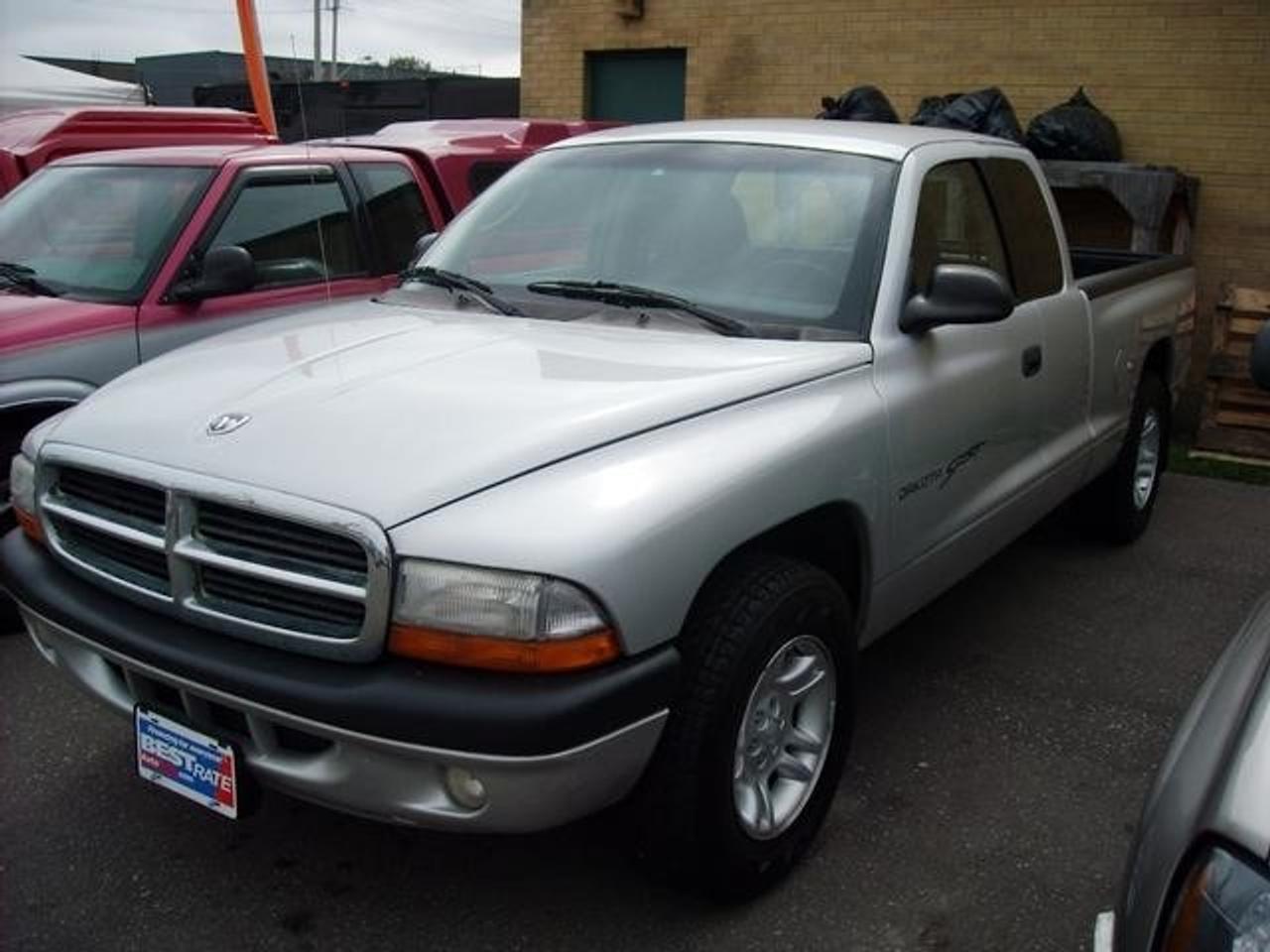 $190/Monthly for 36 months with $0 down

Ready to roll! What a price for a Sport Dakota! Are you interested in a wonderful, do-it-all truck? Then take a look at this good-looking 2001 Dodge Dakota. This versatile Dakota can get whatever you need done, with comfort, class, and safety solid, well-built truck we found fun to drive...If you dont want a full-size truck and compacts seem too small, then the Dodge Dakota may be just right... <br><br>------------------------------------------------------------------------------------------------------------- <br>To get this great price and a free exclusive gift from SAM on your purchase, you must print out this ad and bring it to have it signed <br><br>Discount # _______________________ <br><br>X_______________________________ <br>Sams Signature