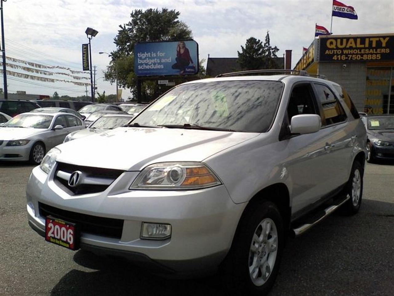 FREE G.P.S OR DUAL DVD ON THE HEADRESTS!! FREE 1-YEAR UNLIMITED KILOMETER POWER-TRAIN WARRANTY!! 132k!, Silver on Black Leather Interior, P/Sunroof, 17\Alloys, CD, Auto, Cl. Control, Tilt, Cruise, Fully Loaded! Running Board,  All vehicles offered for sale are Retail.Taxes are not included. <br />Free GPS or Head rest DVD with finance deals only(O.A.C).Installation charges Extra.Free GPS/DVD is valid only for Finance Deals based on Full Asking Price.