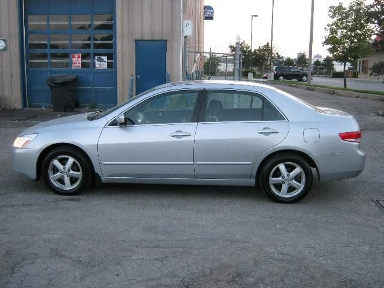 INCREDIBLY SMOOTH AND SLEEK! SILVER OVER BLACK LEATHER INTERIOR. SPECIAL OPTIONS INCLUDE: POWER DOOR LOCKS, POWER WINDOWS, KEYLESS ENTRY, CRUISE CONTROL, 6-CD CHANGER, ALLOY WHEELS, POWER SUNROOF AND MUCH, MUCH MORE! MINT CONDITION! YOURS FOR ONLY $8,888 AT CHECK LIST AUTO SALES! FINANCING AVAILABLE FOR MODELS MANUFACTURED IN 2003 OR LATER! CONTACT US FOR DETAILS!