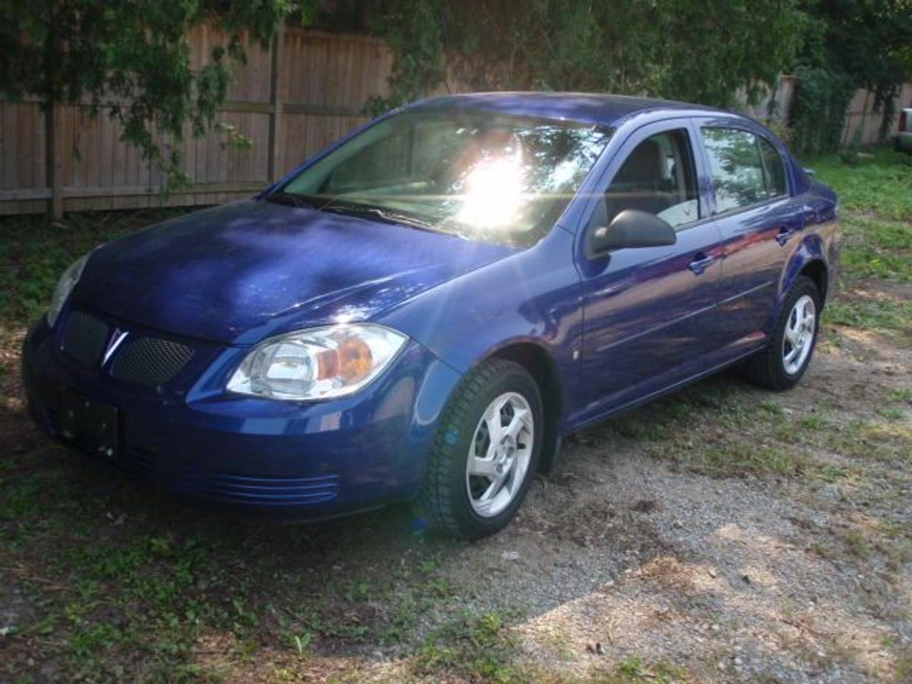 This 2006 Pontiac Pursuit 4dr SPOILER!! AUTO!! GM LEASE RETURN!! Sedan features a 2.2L L4 SFI 4 cyl Gasoline engine. It is equipped with a Automatic transmission. The vehicle is Blue with a Grey Cloth interior. It is offered with the remaining factory warranty. Over 400 BETTER used cars in stock!! PLEASE CALL 1-866-348-8146 5.99% Financing + no payments up to 6 months available on approved credit!! Free Trial Exchange!! A+ Better Business Bureau rating!! Voted Guelphs Favourite dealer 2004-2009!! Since 1961. Taxes, licensing, and $5.00 OMVIC fee are extra. Call for details on our Free Trial Exchange! Thank you for considering Wilsons!!! Please call 1-866-348-8146. - This Pontiac is in Excellent overall exterior condition, Excellent overall interior condition, Cloth seats - Air Conditioning, Cruise Control, Power Steering, Power Windows, Power Door Locks, Power Mirrors, Clock, Tachometer, Digital Info Center, Tilt Steering Wheel, Steering Wheel Radio Controls, Driver Airbag, Passenger Airbag, Keyless Entry, ABS Brakes, Rear Defogger, Intermittent Wipers, AM-FM, CD Player, Wheels, Cloth Interior Surface - Contact The Internet Department at 866-738-6045 or leads@markwilsonsbetterusedcarstc.dealer.com for more information. -