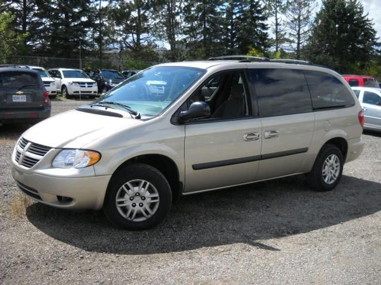 This 2007 Dodge Grand Caravan SE STOW&GO!! QUADS!! CHRYSLER LEASE RETURN!! Van features a 3.3L V6 OHV 6 cyl Gasoline engine. It is equipped with a Automatic transmission. The vehicle is LINEN GOLD with a Grey Cloth interior. It is offered with the remaining factory warranty. Over 400 BETTER used cars in stock!! PLEASE CALL 1-866-348-8146 5.99% Financing + no payments up to 6 months available on approved credit!! Free Trial Exchange!! A+ Better Business Bureau rating!! Voted Guelphs Favourite dealer 2004-2009!! Since 1961. Taxes, licensing, and $5.00 OMVIC fee are extra. Call for details on our Free Trial Exchange! Thank you for considering Wilsons!!! Please call 1-866-348-8146. - This Dodge is in Excellent overall exterior condition, Excellent overall interior condition, Cloth seats - Air Conditioning, Climate Control, Cruise Control, Power Steering, Power Windows, Power Door Locks, Power Mirrors, Roof Rack, Rear Air Conditioning, Clock, Tachometer, Digital Info Center, Tilt Steering Wheel, Driver Airbag, Passenger Airbag, Keyless Entry, ABS Brakes, Rear Defogger, Intermittent Wipers, AM-FM, CD Player, Wheels, Cloth Interior Surface - Contact The Internet Department at 866-738-6045 or leads@markwilsonsbetterusedcarstc.dealer.com for more information. -