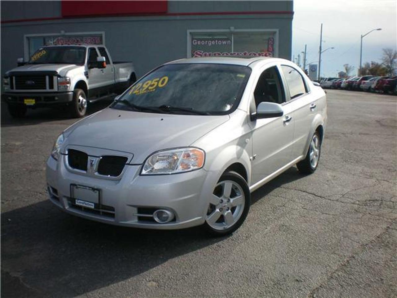 WOW JUST TRADED, MINT! POWER SUNROOF, ALLOY WHEELS, POWER EVERYTHING, CRUISE CONTROL, ONLY 33,000KMS!! VERY FUEL EFFICIENT, FUN AND SPORTY, LOADED. COME FOR YOUR TEST DRIVE TODAY. BUY FROM A TRUSTED CAR>NATION DEALERSHIP. FREE OIL FOR LIFE! CALL FOR YOUR VIP APPOINTMENT TODAY. PRICE IS PLUS HST, BUT TEST DRIVES ARE FREE!! 
AM/FM Stereo 
Air Conditioning 
Alloy Wheels 
CD Player 
Cloth Interior 
Cruise Control 
Digital Clock 
Driver Side Airbag 
Dual Airbag 
Fog Lights 
Intermittent Wipers 
Keyless Entry 
Passenger Airbag 
Power Brakes 
Power Locks 
Power Mirrors 
Power Sunroof 
Power Windows 
Tilt Steering 
Tinted Windows