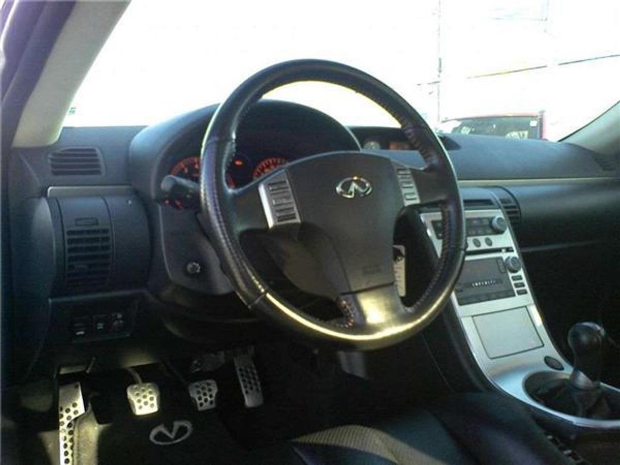 ABSOLUTELY THE NICEST INFINITI COUPE AROUND - WE GUARANTEE IT! Fully Loaded with Leather Interior, 6 Speed Manual Transmission, Bose Sound System, Great Silver on Black Combination, Heated Seats, Forged Aluminum Wheels, Vehicle Dynamic Ciontrol, and lots more. Call 1-888-586-5493 to book your viewing today! Located just 2 minutes off the QEW in St Catharines. Price does not include HST or Licencing
