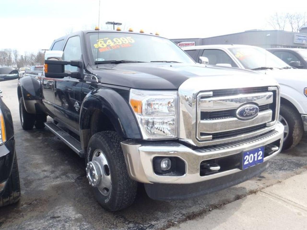 6.7L. 8 CYL. COME IN TODAY AND TAKE THIS BIG BOLD AND BEAUTIFUL TRUCK FOR A TEST DRIVE.  2012 FORD F-450 LARIAT CREW CAB DIESEL WITH 4X4,DUAL ZONE AIR AND HEAT,SIRIUS SAT RADIO,FOG LIGHTS,KEYPAD ENTRY,BACKUP CAMERA WITH SENSORS,POWERSCOPE TRAILER TOW MIRRORS,SYNC VOICE ACTIVATED SYSTEM,TRAILER TOW PKG,POWER SLIDING REAR WINDOW,FRONT TOW HOOKS,CHROME TUBULAR CAB STEPS,UPFITTER SWITCHES,POWER SLIDING MOONROOF,NAVIGATION,REMOTE START,LEATHER WRAPPED STEERING WHEEL WITH CONTROLS,REMOTE START,HEATED AND COOLED MEMORY LEATHER ADOBE SEATS. LOADED!!!    30 Years in business, A+ BBB rated company, 200 units in stock, 2 locations.  Home of the Warranty for Life, full service department, on the spot financing.    Bad credit welcomed.    Winner of Reader Choice Award for the best dealer in the Listowel area.   Winner Of Business Of The Year Award from the North Perth Chamber Of Commerce!   Free carproof or carfax.    No extra fees no extra costs.    All prices + HST & Licensing.    Save money!   (Thanks for shopping at STOP23 AUTO SALES LTD).