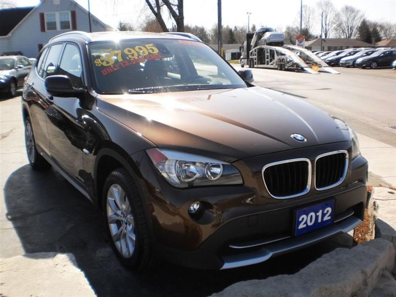 2.0L. 4 CYL.   THIS GORGEOUS MARRAKESH BROWN METALLIC WITH BLACK LEATHERETTE HEATED SEATS COMES WITH THE FOLLOWING FEATURES. ITS AN X-DRIVE,AWD,WITH SUNROOF,FOG LIGHTS,ROOF RAILS,PUSH BUTTON START,LEATHER WRAPPED STEERING WHEEL WITH CONTROLS AND MUCH MORE!!!  30 Years in business, A+ BBB rated company, 200 units in stock, 2 locations.  Home of the Warranty for Life, full service department, on the spot financing.    Bad credit welcomed.    Winner of Reader Choice Award for the best dealer in the Listowel area.   Winner Of Business Of The Year Award from the North Perth Chamber Of Commerce!   Free carproof or carfax.    No extra fees no extra costs.    All prices + HST & Licensing.    Save money!   (Thanks for shopping at STOP23 AUTO SALES LTD).