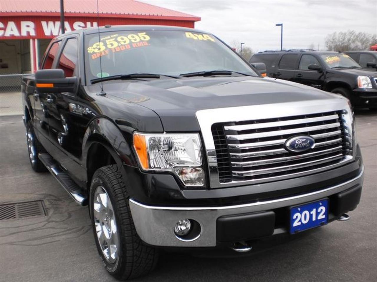 5.0L.8CYL.  COME IN AND TEST DRIVE THIS BEAUTIFUL BLACK ON GREY TRUCK TODAY! THIS 2012 FORD F-150  XLT SUPER CREW COMES WITH THE FOLLOWING FEATURES.  ITS A 4X4,6 PASSENGERS,RUNNING BOARDS,FOG LIGHTS,FRONT TOW HOOKS,KEYPAD ENTRY,BOX LINER,MICROSOFT SYNC,LEATHER WRAPPED STEERING WHEEL WITH CONTROLS. AND MUCH MORE!!!    30 Years in business, A+ BBB rated company, 200 units in stock, 2 locations.  Home of the Warranty for Life, full service department, on the spot financing.    Bad credit welcomed.    Winner of Reader Choice Award for the best dealer in the Listowel area.   Winner Of Business Of The Year Award from the North Perth Chamber Of Commerce!   Free carproof or carfax.    No extra fees no extra costs.    All prices + HST & Licensing.    Save money!   (Thanks for shopping at STOP23 AUTO SALES LTD).