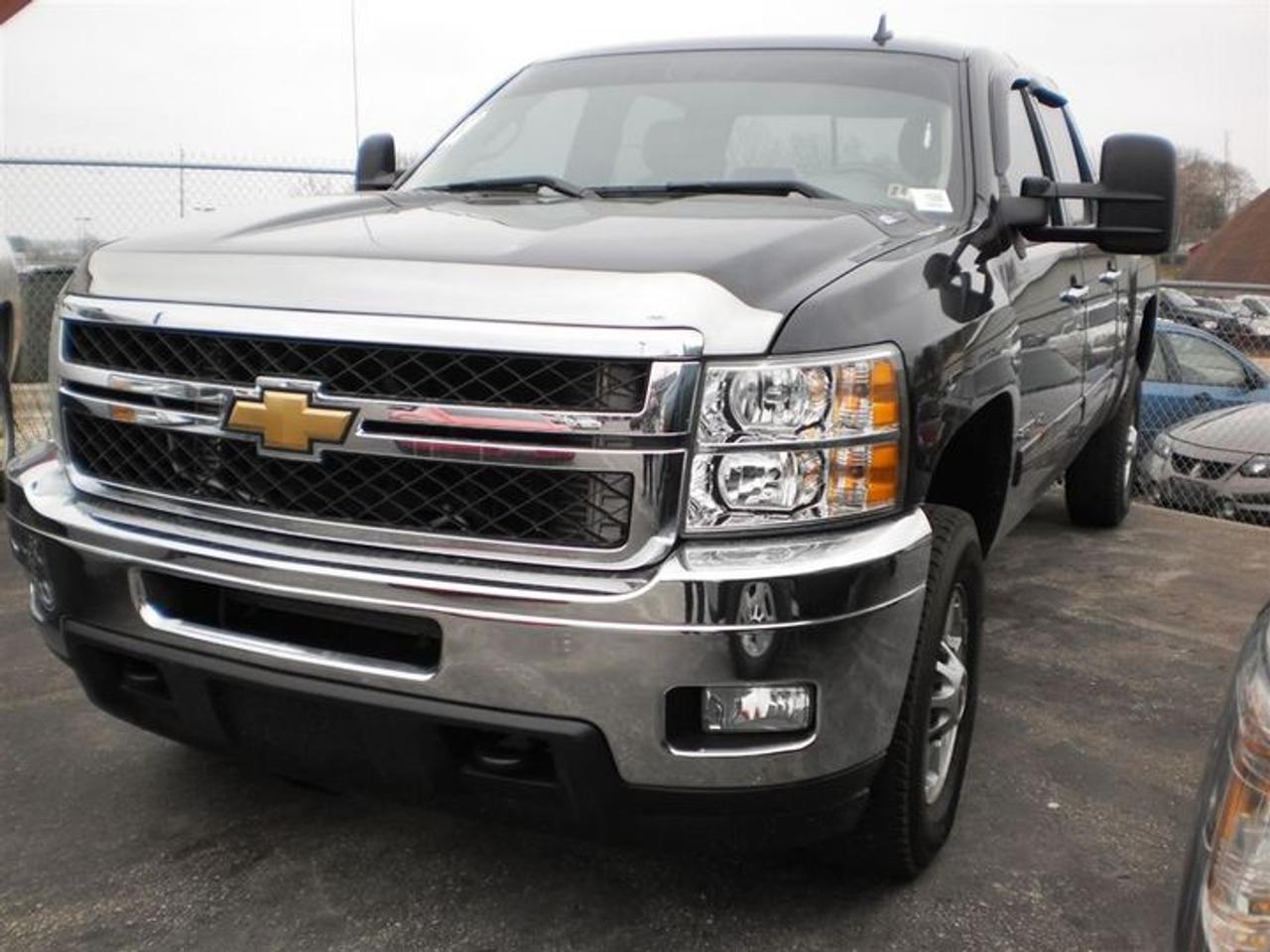 6.6L. V8.  2011 CHEVROLET SILVERADO 2500 HD LTZ WITH CREW CAB,DIESEL,4X4,FRONT TOW HOOKS,FOG LIGHTS,LINED BOX,BACKUP CAMERA,POWER SLIDING REAR WINDOW,ONSTAR,POWER PEDAL,DUAL AIR AND HEAT,HEATED LEATHER MEMORY SEATS,LEATHER WRAPPED STEERING WHEEL WITH CONTROLS,TAILGATE LOCK,REMOTE START,POWER PEDALS,DUAL ZONED AIR AND HEAT,XM SAT RADIO,UNIVERSAL REMOTE,USB PORT. LOADED!!!  30 Years in business, A+ BBB rated company, 200 units in stock, 2 locations.  Home of the Warranty for Life, full service department, on the spot financing.    Bad credit welcomed.    Winner of Reader Choice Award for the best dealer in the Listowel area.   Winner Of Business Of The Year Award from the North Perth Chamber Of Commerce!   Free carproof or carfax.    No extra fees no extra costs.    All prices + HST & Licensing.    Save money!   (Thanks for shopping at STOP23 AUTO SALES LTD).