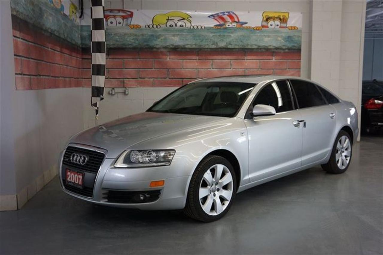 FULLY EQUIPPED INCL....FACTORY NAVIGATION!!!...KEYLESS IGNITION WITH PUSH BUTTON START/STOP!!!...DUAL ZONE AUTO CLIMATE CONTROL!!!...POWER/LEATHER SEATING WITH MEMORY!!!...POWER GLASS SUNROOF!!!...HEATED SEATING!!!!...QUATTRO AWD CONTROL!!!...AND SO MUCH!!!!...100% ACCIDENT FREE CARPROOF VERIFIED!!!!  ON THE SPOT LOW RATE FINANCING OAC
