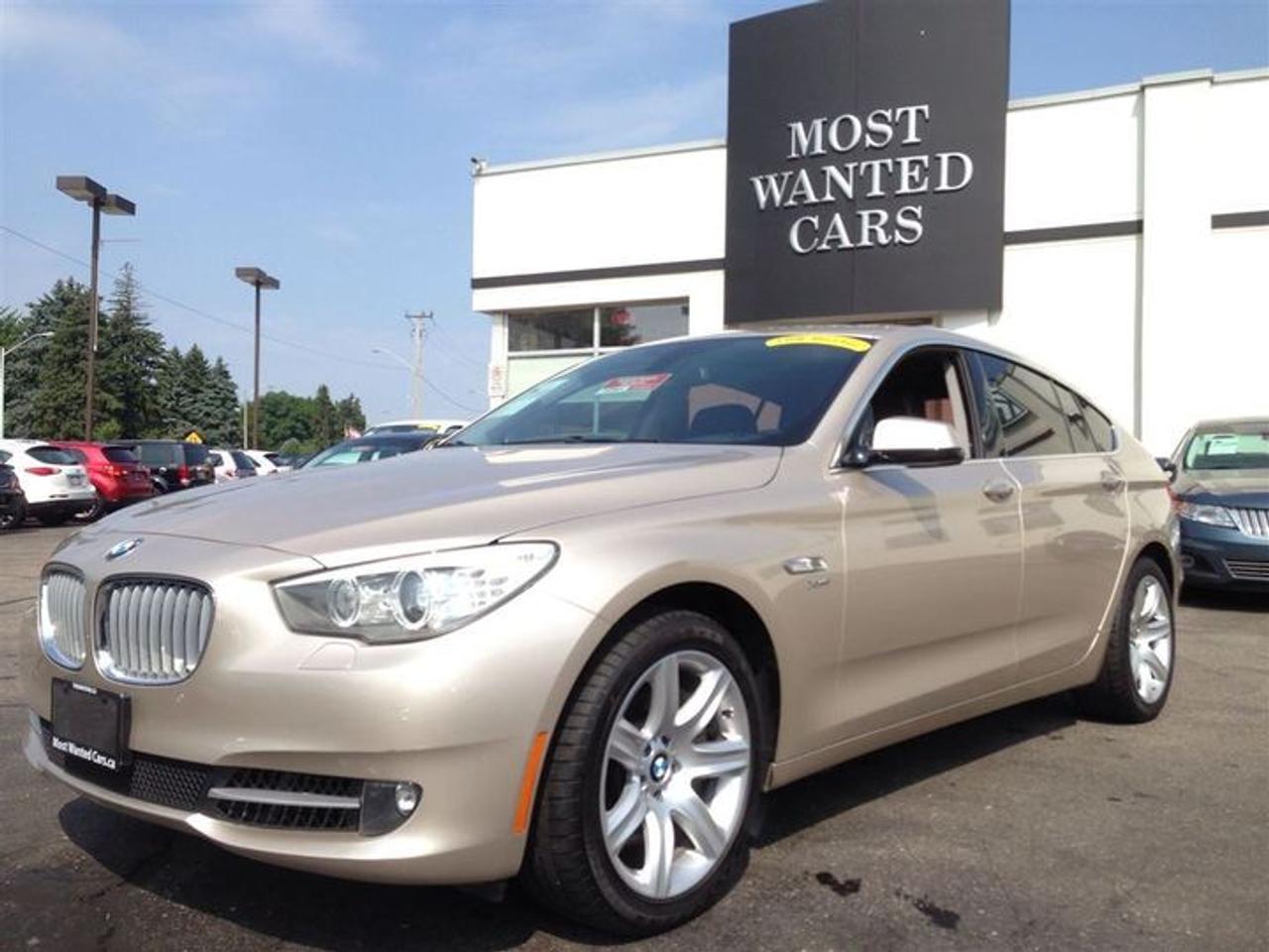 [CARPROOF VERIFIED $0 - NO ACCIDENTS ] - V8 550XI - ALL WHEEL DRIVE - NAVIGATION W/ HD SCREEN - HEATED/COOLED/POWER/MEMORY SEATS - REAL LEATHER SEATS - 20 WAY POWER/MASSAGE SEATS W/ - REAR HEATED SEATS - AUTO/DUAL FRONT & REAR AIR - ADJUSTABLE REAR SEATS - HARD DRIVE MUSIC/BLUETOOTH/PREMIUM AUDIO - REAR CAMERA - FRONT/REAR SENSORS - DUAL/PANORAMIC SUNROOF - HEADS UP DISPLAY - WOOD TRIM INTERIOR - TINTED WINDOWS - REAR AIR RIDE SUSPENSION - XENON HEADLIGHTS - DUAL REAR POWER SUNSHADES - KEYLESS GO - AUTO LOCK/UNLOCK - SPORT PLUS/COMFORT MODE - DYNAMIC TRACTION - 19 INCH ALLOY WHEELS - FLAP FOLDING MIRRORS - LED TAILIGHTS - POWER TAILGATE - ILLUMINATED DOOR HANDLES - HILL ASCENT - AUTO HOLD - TIRE PRESSURE MONITOR - ABS - STEERING AUDIO CONTROLS - Easy online application at WWW.THEOMOTORS.COM. Everyone and all credit welcome!! We have over 200 used Cars, Trucks, Vans and SUVs  available.! PLEASE CALL1 (519)772-3040. Ask about our exclusive  preferred financing! THIS ACCIDENT FREE DIRECT BMW LEASE comes  CERTIFIED  SERVICED  E-TESTED  and 167 point inspection at NO EXTRA CHARGE. A+ Better Business Bureau rating!! Taxes and licensing are extra. Financing special is on approved credit only, and a minimum loan of $7,500. Accrued interest must be paid on a 6-month payment deferral. Cost of borrowing a $20,000 car over a 48 month term at 4.99% is $2,377.28. THANK YOU and we appreciate  your consideration at THEOMOTORS.SERVING K-W AREA FOR OVER 30 YEARS!!