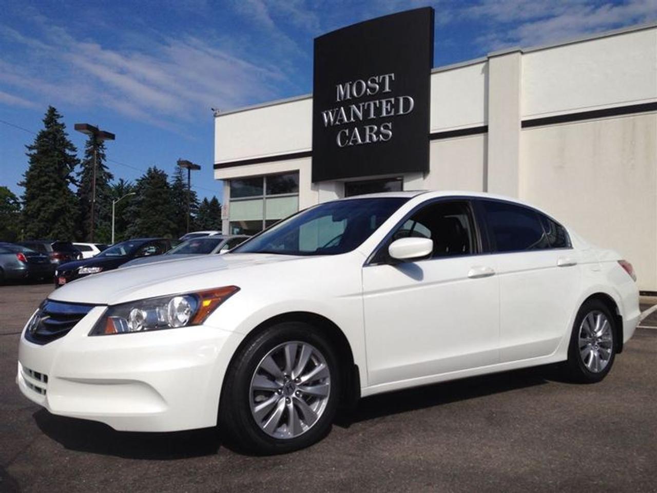 [ CARPROOF VERIFIED $0 - ACCIDENT FREE ] - FORMER LEASE - LEATHER/HEATED/POWER SEATS - POWER SUNROOF - PREMIUM AUDIO W. SUBWOOFER - BLUETOOTH - 6 DISC CD CHANGER - AUX/MP3 IN - STEERING WHEEL AUDIO CONTROLS - AUTO/DUAL CLIMATE CONTROL - AUTO ON/OFF HEADLIGHTS - TINTED WINDOWS - POWER WINDOWS/MIRRORS/DOORS - WOOD-TRIM INTERIOR - TIRE PRESSURE MONITOR - ABS + VEHICLE STABILITY - 17 INCH ALLOYS - ADJUSTABLE CENTRE CONSOLE - Easy online application at WWW.THEOMOTORS.COM. Everyone and all credit welcome!! We have over 200 used Cars, Trucks, Vans and SUVs  available.! PLEASE CALL1 (519)578-8700. Ask about our exclusive  preferred financing! This ACCIDENT FREE former LEASE RETURN comes  CERTIFIED  SERVICED  E-TESTED  and 167 point inspection at NO EXTRA CHARGE. A+ Better Business Bureau rating!! Taxes and licensing are extra. Financing special is on approved credit only, and a minimum loan of $7,500. Accrued interest must be paid on a 6-month payment deferral. Cost of borrowing a $20,000 car over a 48 month term at 4.99% is $2,377.28. THANK YOU and we appreciate  your consideration at THEOMOTORS.SERVING K-W AREA FOR OVER 30 YEARS!!