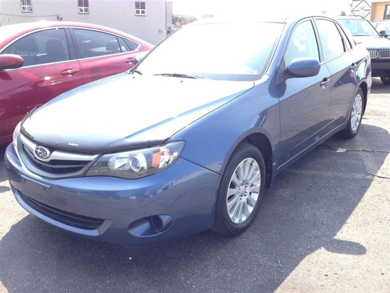 [CARPROOF VERIFIED $0 - NO ACCIDENTS ] - FORMER LEASE - SYMMETRICAL AWD - SPOILER - BLUETOOTH - STEERING WHEEL AUDIO CONTROLS - 16 INCH ALLOYS - AUX IN/MP3/USB - DUAL EXHAUST - TRACTION CONTROL + ABS - CRUSE CONTROL - Easy online application at WWW.THEOMOTORS.COM. Everyone and all credit welcome!! We have over 200 used Cars, Trucks, Vans and SUVs  available.! PLEASE CALL1 (519)772-3040. Ask about our exclusive  preferred financing! This ACCIDENT FREE FORMER LEASE return comes  CERTIFIED  SERVICED  E-TESTED  and 167 point inspection at NO EXTRA CHARGE. A+ Better Business Bureau rating!! Taxes and licensing are extra. Financing special is on approved credit only, and a minimum loan of $7,500. Accrued interest must be paid on a 6-month payment deferral. Cost of borrowing a $20,000 car over a 48 month term at 4.99% is $2,377.28. THANK YOU and we appreciate  your consideration at THEOMOTORS.SERVING K-W AREA FOR OVER 30 YEARS!!