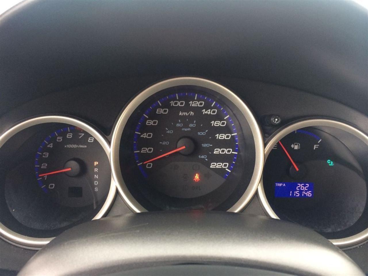 636981