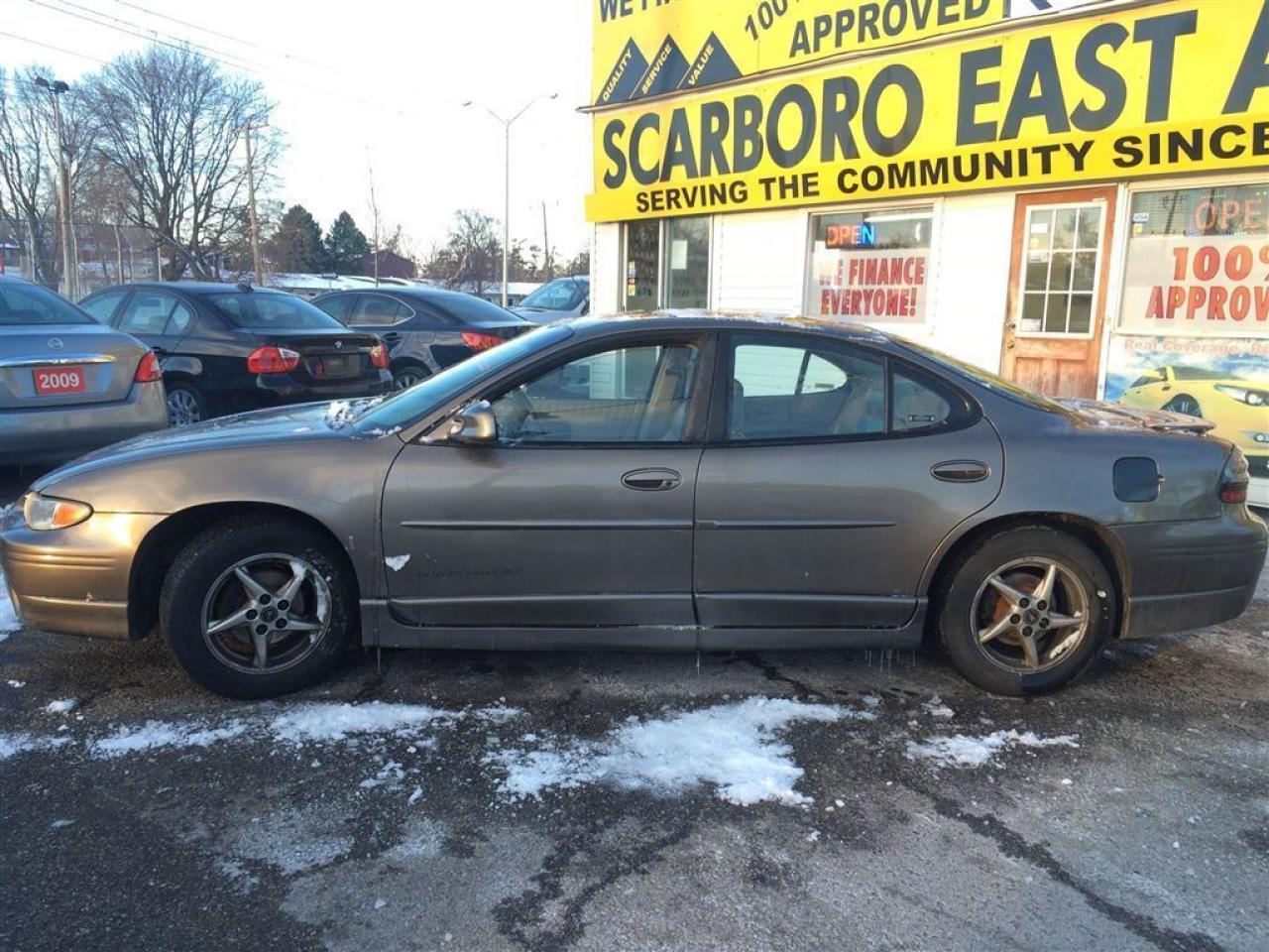 636997