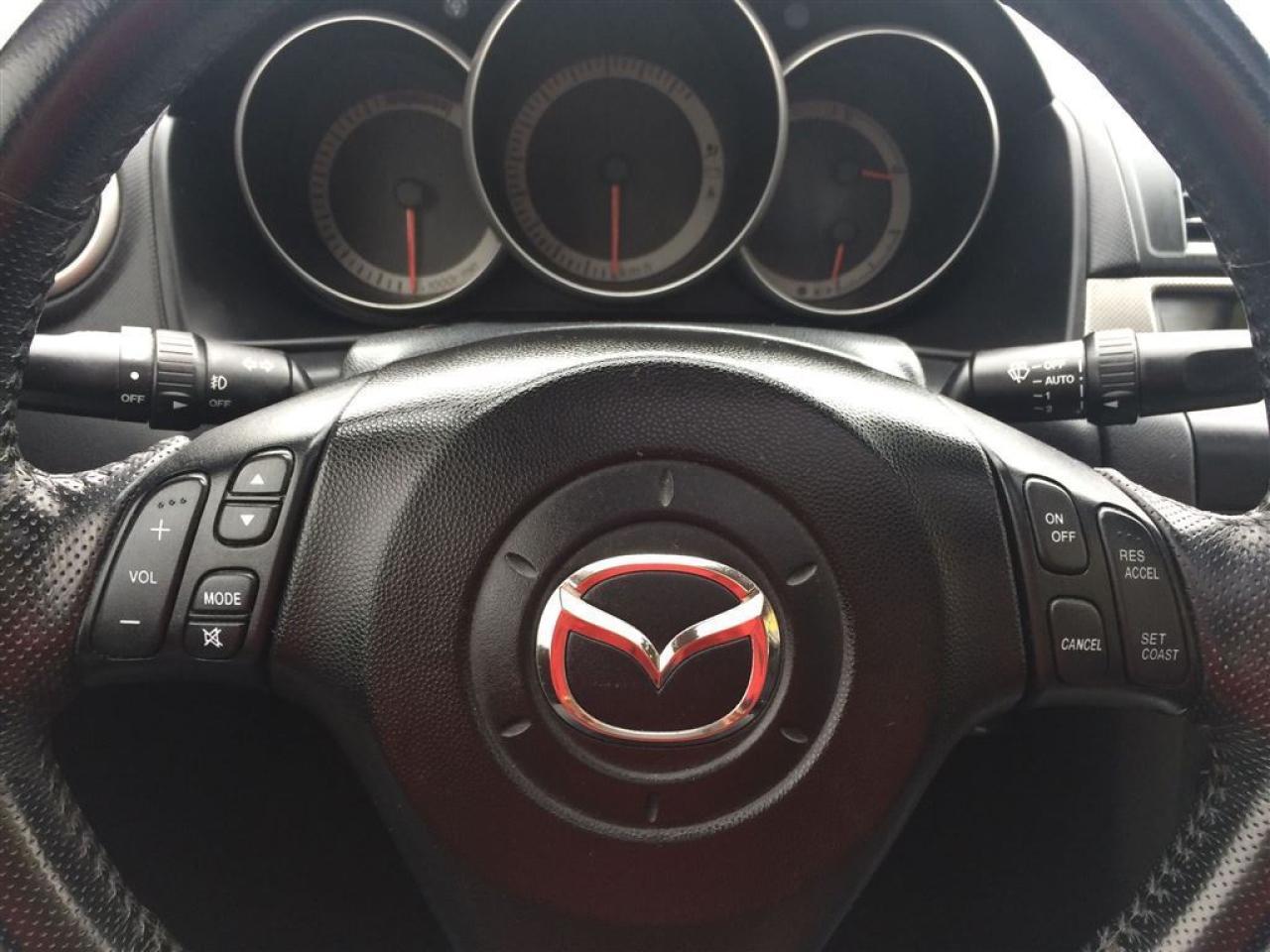 637077
