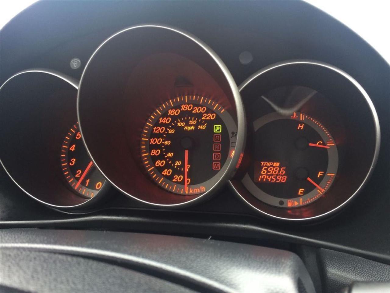 637077