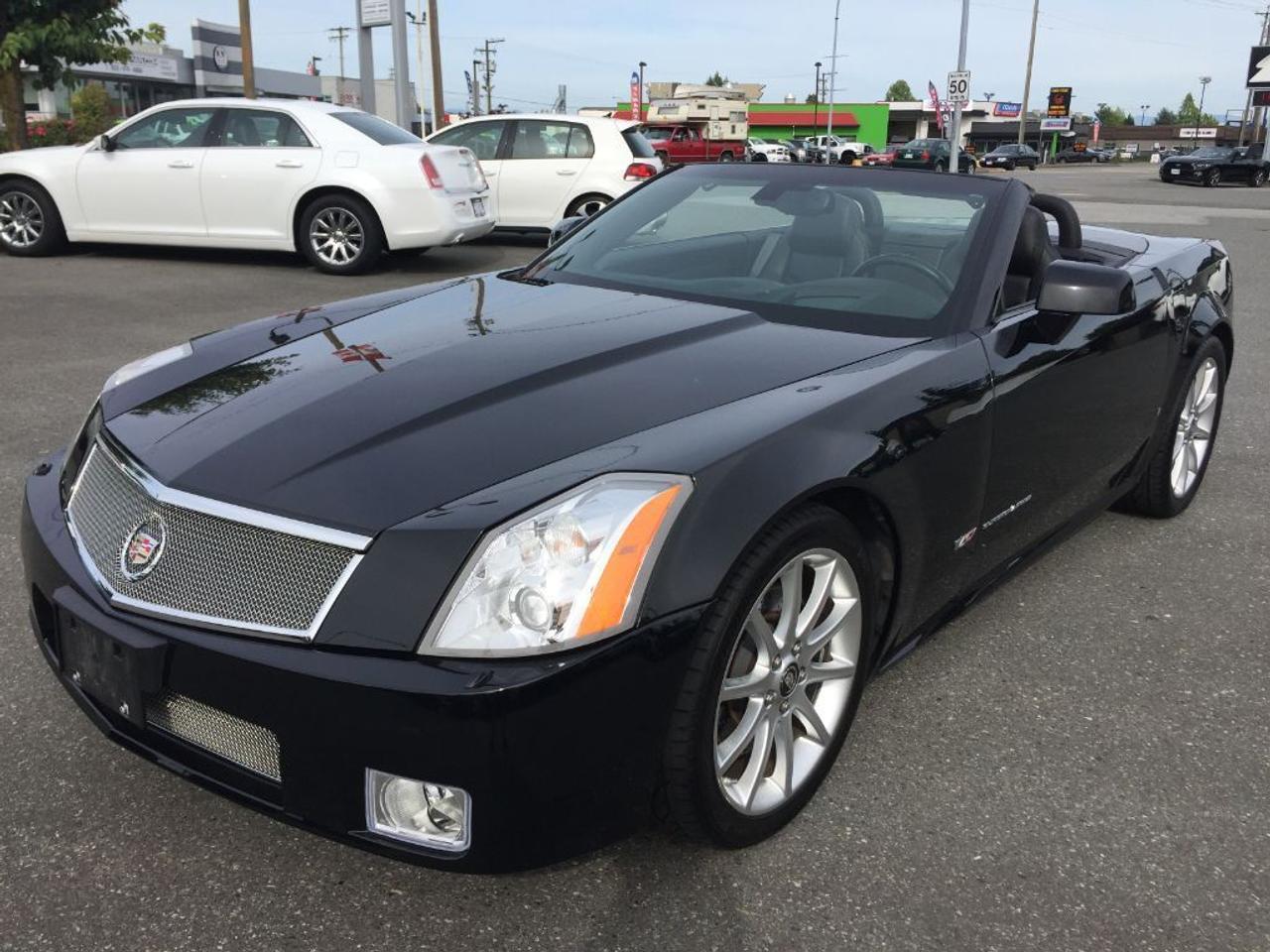 2006 Cadillac XLR-V, Supercharged 443HP V8 4.4L, 6spd Automatic, Retractable Hardtop, Navigation, Head-up Display, Heated Seats, Power Seats, Touch Door Handles, Premium Audio, Speed Sensing Steering, Adaptive Suspension, Bucket Seating for 2, Rear Wheel Drive, Extra Clean with ONLY 44,700kms! Come and see this beauty!!