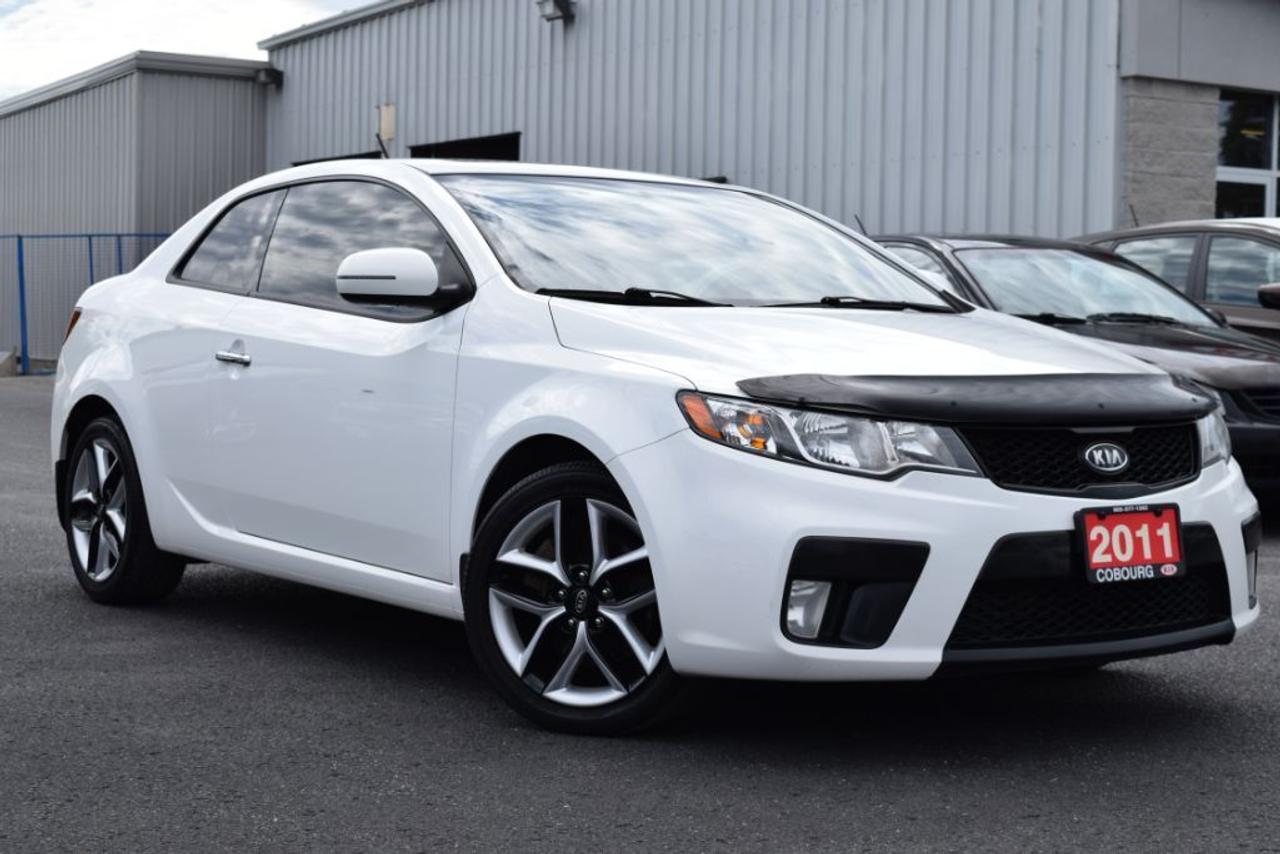 <p>HEATED SEATS. LEATHER. SUNROOF. 6 SPEED MANUAL TRANSMISSION. S DOOR. ONE OWNER.</p>
<p>This stylish 2 door Koup is fresh on the lot and it is a stunner! Come in and take it for a test drive before it is too late!&nbsp;</p>
<p>Selling price INCLUDES all dealer fees, Safety Certification, Emissions test & Re-conditioning. EXTRA CHARGES: HST, Licensing fees.&nbsp;</p>
<p>Most value for your money vs best value for your money: The Most - When a vehicle is listed very low compared to the same year, kilometers, specs & body condition. Most dollar value for your money. The Best - When a vehicle is listed well but not the lowest because it is updated with all major maintenance items far above safety standards. Well priced, best dollar value. Get the best value for your money.&nbsp;</p>
<p>At Cobourg Kia, we deliver great vehicles with a great customer experience. Cobourg Kia is a family owned dealership established in 2001. Cobourg Kia proudly serves the Cobourg, Port Hope, Baltimore, Grafton, Castleton, Gores Landing, Roseneath, Colborne, Brighton, Warkworth, Trenton, Belleville, Peterborough, Bowmanville, Clarington, Newcastle, Courtice, Oshawa & Whitby area. We can help arrange your Auto Financing through top tier banks such as RBC, BMO, Scotia, TD & more. Find out more about Cobourg Kia by visiting their website: www.CobourgKIA.com - CREDIT CHALLENGED? - WE CAN HELP 99% APPROVALS www.CobourgCreditCentre.com</p>
<p>&nbsp;</p>