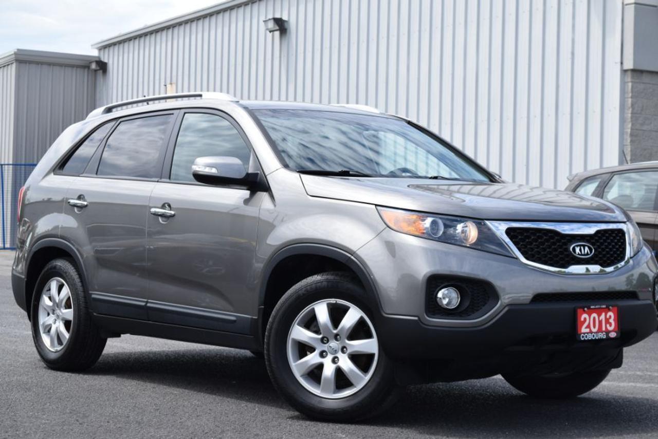 <p>CLEAN CARPROOF. FWD. BLUETOOTH. HEATED SEATS. FACTORY WARRANTY REMAINING.</p>
<p>This Sorento is in pristine condition and comes with a trunk cargo mat. Come on down and take it for a test drive to feel the powerful V6 engine and superb handling.&nbsp;</p>
<p>Selling price INCLUDES all dealer fees, Safety Certification, Emissions test & Re-conditioning. EXTRA CHARGES: HST, Licensing fees.&nbsp;</p>
<p>Most value for your money vs best value for your money: The Most - When a vehicle is listed very low compared to the same year, kilometers, specs & body condition. Most dollar value for your money. The Best - When a vehicle is listed well but not the lowest because it is updated with all major maintenance items far above safety standards. Well priced, best dollar value. Get the best value for your money.&nbsp;</p>
<p>At Cobourg Kia, we deliver great vehicles with a great customer experience. Cobourg Kia is a family owned dealership established in 2001. Cobourg Kia proudly serves the Cobourg, Port Hope, Baltimore, Grafton, Castleton, Gores Landing, Roseneath, Colborne, Brighton, Warkworth, Trenton, Belleville, Peterborough, Bowmanville, Clarington, Newcastle, Courtice, Oshawa & Whitby area. We can help arrange your Auto Financing through top tier banks such as RBC, BMO, Scotia, TD & more. Find out more about Cobourg Kia by visiting their website: www.CobourgKIA.com - CREDIT CHALLENGED? - WE CAN HELP 99% APPROVALS www.CobourgCreditCentre.com</p>
