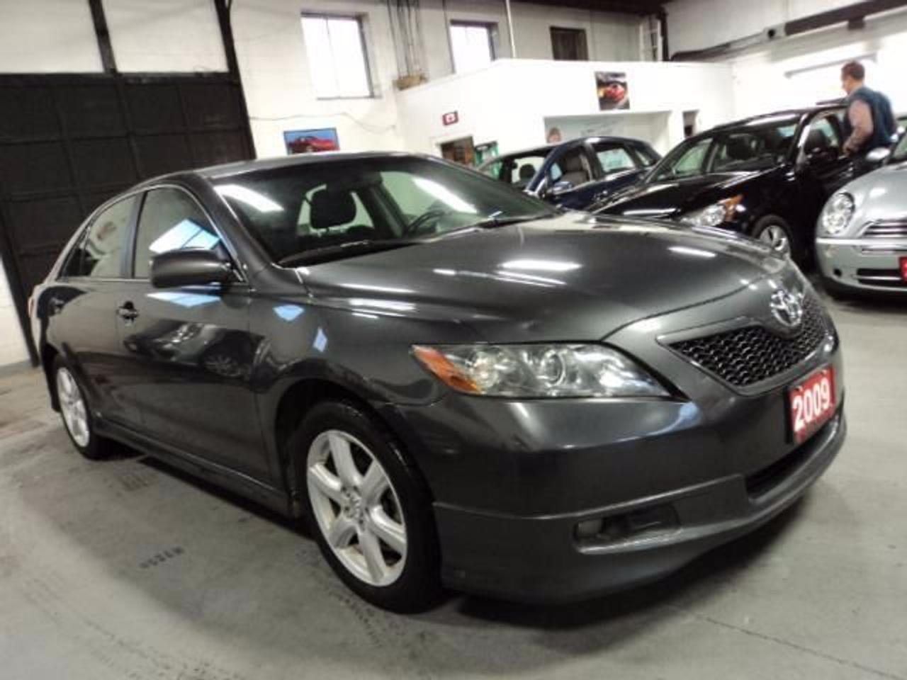 2009 Toyota Camry SE -Fully Loaded,Alloy wheels,Sunroof, Fully Certified (Safety and E-Test )

This 2009 Toyota Camry is fuel efficient and very reliable. Comes loaded with power options included power seats. Grey exterior with grey interior, this vehicle is an absolute beauty. Runs and Drives great!

Buy In Confidence, Ontario Registered Dealer. 

CarProof Available! 

If you are interested we are here to serve you seven days a week. Do not wait; come on in for a test drive, or call to book an appointment. 

For our contact information, or to view other vehicles from our inventory please see ?Poster Contact Information? on the right side of this page. 

Also regardless of your credit history we can assist you in matching the right financial plan that meets your specific needs. Good Credit/Bad Credit we finance everyone! 

416 Auto Group 

Phone: 416-741-5655 
853 Garyray Drive, Unit 1 
Toronto, Ontario, M9L 1R2 
sales@416autogroup.com 

VEHICLE OPTIONS:
Air Conditioning
Cruise control
Power locks
Power mirrors
Power steering
Power trunk
Remote keyless entry
Tilt wheel
Power windows
Rear window defroster
CD player
Premium audio
Bucket seats
Airbag: driver
Airbag: passenger
Alarm
Anti-lock brakes
Traction control
Alloy wheels
Sunroof/Moonroof
Engine: 4 Cylinder Engine 2.4L/146
L/100Km City: 9.5
L/100Km Hwy: 6.2
Mechanical Equipment
2.4L DOHC VVT-i SMPI 16-valve 4-cyl engine
5-speed automatic transmission w/OD
Chrome tail pipe
Electronic throttle control system w/intelligence (ETCS-i)
Front & rear stabilizer bars
Front wheel drive
Independent dual-link MacPherson sport rear suspension -inc: gas strut, coil springs
MacPherson sport tuned front suspension -inc: gas strut, coil springs
Pwr rack & pinion steering
Pwr-assisted ventilated front/solid rear disc brakes
Interior Equipment
3-spoke leather-wrapped tilt & telescopic steering wheel w/audio controls
60/40 fold-down rear seat -inc: fold-down centre armrest w/pass-through, rear security lock
Air conditioning -inc: cabin air filter & rear seat heater ducts
Aluminum sport pedals w/rubber inserts
Auxiliary pwr outlet
Carpeting w/carpeted floor mats
Cruise control
Digital clock
Driver footrest
Electrochromic rearview mirror w/digital compass
Exterior Equipment
17 aluminum alloy wheels w/locks
Colour-keyed bumpers
Colour-keyed door handles
Colour-keyed rear spoiler
Colour-keyed side skirts
Dual colour-keyed heated pwr mirrors
Fog lamps
Full size spare tire
High solar energy-absorbing window glass
P215/55R17 all-season tires
Safety Equipment
3-point seat belts in all positions
Adjustable B-pillar shoulder belt anchors
Anchor points for child restraint seats
Child-protector rear door locks
Driver/front passenger frontal airbags
Driver/front passenger knee airbags
Front & rear side curtain airbags
Front seat belt pretensioners & force limiters
Front seat-mounted side airbags
Entertainment Equipment
AM/FM stereo w/MP3/WMA/CD player -inc: audio aux input jack, (6) speakers