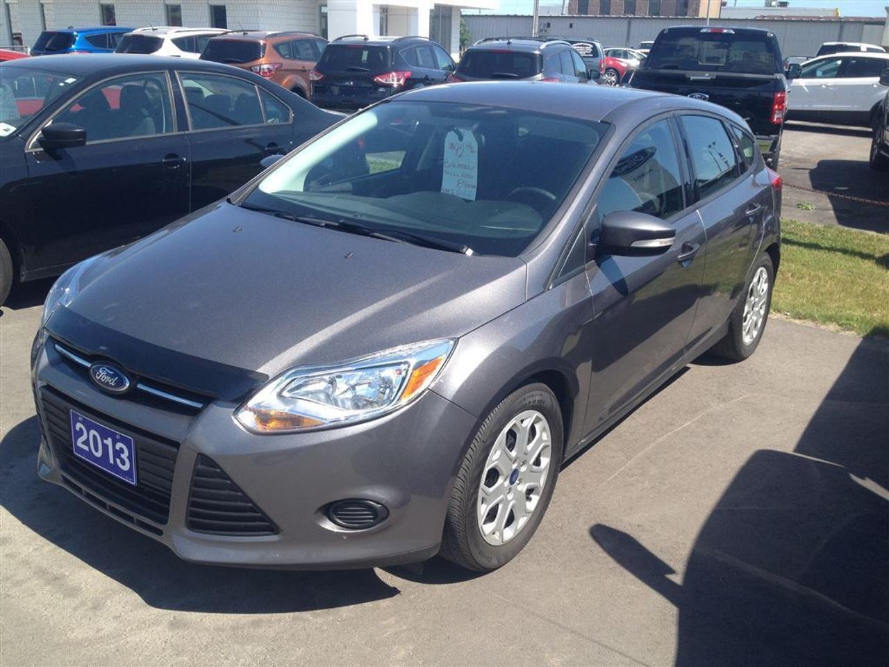 CALL NAPANEE @ 1-888-711-9673 FOR MORE INFO - THIS CLEAN FOCUS HATCHBACK IS EQUIPPED WITH HEATED SEATS, BLUETOOTH, CRUISE CONTROL, SYNC AUX PLUGIN, AIR CONDITIONING, POWER WINDOWS AND LOCKS, KEYLESS ENTRY AND MORE! PRICED AT ONLY $12,995 OR PAYMENTS OF $92.96 BIWEEKLY TAX AND LIC EXTRA 84MTHS O.A.C.