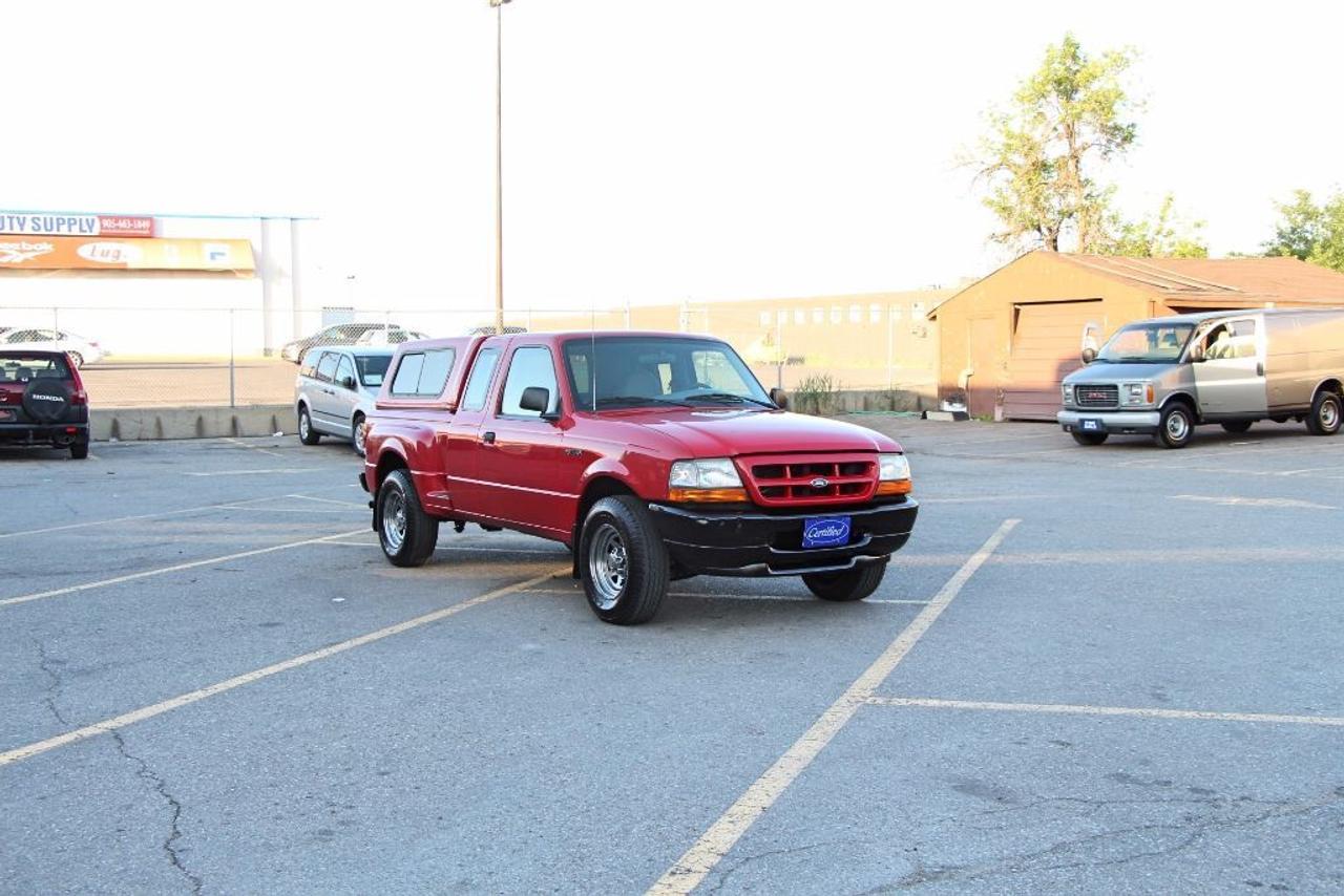 Khyber Motors LTD
FINANCING AVAILABLE WITH ANY CREDIT GOOD, BAD, EVEN BANKRUPTCY! 
Monday-Friday 9:00AM - 8:00PM
Sat & Sunday 10:00AM - 7:00PM

1999 Ford Ranger

IF AD IS UP VEHICLE IS AVAILABLE
TO SEE MORE PICTURES AND A VIDEO WALK AROUND OF THIS VEHICLE PLEASE CLICK LINK BELOW:

http://khybermotors.com/1999_ford_ranger.html

All-In Price:$4,950
Specifications:
Price.....................$4,950
Year.....................1999
Make.....................Ford
Model.....................Ranger
Kilometres.....................143,786 KM
Transmission.....................Manual
Engine Size.....................3.0L
Cylinders.....................6-Cylinder
Fuel Type.....................Gas
Body Style.....................Pick-up
Passengers.....................2-Pass
Doors.....................2-Door
Ext. Colour.....................Red
Int. Colour.....................Gray

CarProof Report
To View The CarProof Report Please Click Link Below:

https://reports.carproof.com/main?id=MUA+XskxZTkwC9vL2VtCGB8Tswdrwgkw

Description

Khyber Motors ltd
Buy-Sell-Trade
Member of OMVIC and UCDA
Buy with Confidence!
Buy with Full Disclosure!
Family Owned & Operated Business

All-In Price
$4,950
+Just Plus Tax and Licensing
No Hidden Charges or Extra Fees
Taxes and Licensing not included in the price

Certified, E-Tested, and a 2 Year Warranty
INCLUDED IN THE PRICE?

Warranty

2 Year Powertrain Warranty Covers:

1) Engine
2) Transmission
3) Head Gasket
4) Transaxle/Differential

2 Years, Unlimited kilometers, ($1,000 Per Claim)
WARRANTY IS INCLUDED IN THE PRICE?

Financing
FINANCING AVAILABLE WITH ANY CREDIT GOOD, BAD EVEN BANKRUPTCY! 
 Click the link below to fill out our secure online financing application and we will contact you shortly.
https://www.carpages.ca/dealer/brampton/khyber-motors-ltd/credit/

BUY WITH CONFIDENCE
BUY FROM AN ONTARIO REGESTERED DEALER
We are a Proud Member of OMVIC and UCDA

If you have any further questions please call (647)-927-5252 or email us at mohsamyou@hotmail.com

To see more of our vehicles please visit Khybermotors.com?or Click below:

Khyber Motors LTD
90 Kennedy road south Brampton L6W 3E7
Office-(416)-419-6727
Cell- (647)-927-5252

The list of options on the vehicles is automatically VIN decoded and as a result there may be discrepancies between what is listed and the vehicle. Please check with dealer for details.   While every reasonable effort is made to ensure the accuracy of all information on this site, we are not responsible for any errors or omissions. Please verify any information in question with a dealership sales representative.