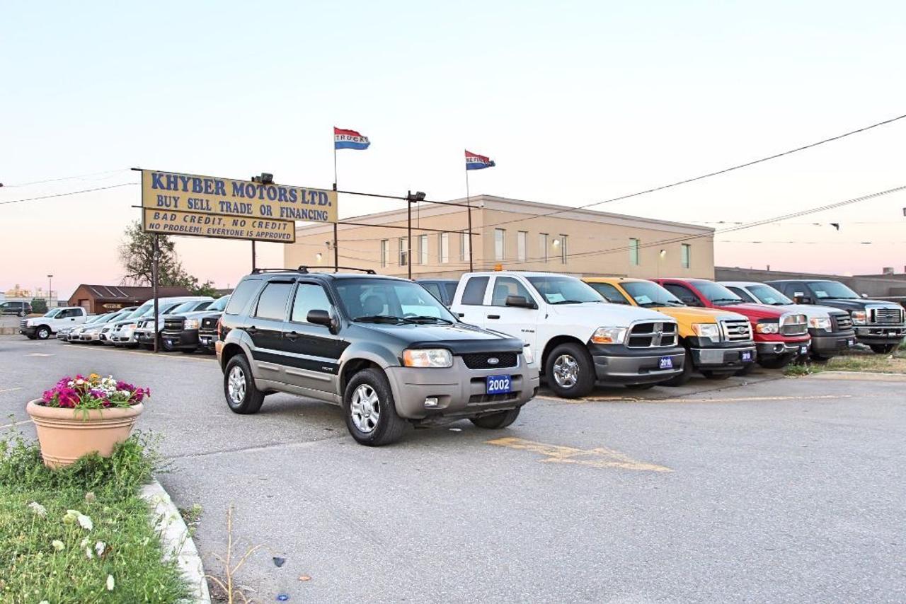 Khyber Motors LTD
FINANCING AVAILABLE WITH ANY CREDIT GOOD, BAD, EVEN BANKRUPTCY! 
Monday-Friday 9:00AM - 8:00PM
Sat & Sunday 10:00AM - 7:00PM

2002 Ford Escape XLT 4X4

IF AD IS UP VEHICLE IS AVAILABLE
TO SEE MORE PICTURES AND A VIDEO WALK AROUND OF THIS VEHICLE PLEASE CLICK LINK BELOW:

http://khybermotors.com/2002_ford_escape_xlt_4x4.html

All-In Price:$2,950
Specifications:
Price........................$2,950
Year........................2002
Make........................Ford
Model........................Escape XLT 4X4
Kilometres........................213,786 KM
Transmission........................Auto
Engine Size........................3.0L
Cylinders........................6-Cylinder
Fuel Type........................Gas
Body Style........................SUV
Passengers........................5-Pass
Doors........................4-Door
Ext. Colour........................Green
Int. Colour........................Gray

Features:
Power Windows
Power locks
Power Mirrors
Power Steering
Adjustable Steering Wheel
Driver Air Bag
Passenger Air Bag
Air Conditioning
Power Drivers Seat
Split Folding Rear Seats
Center Arm Rest
Cup holders
CD player
AM\FM stereo
Anti-theft
Rear Window Defrost
Rear Window Wiper
Fog Lights
Alloy wheels
Keyless entry
Tinted Glass
Cruise control
4 x 4
Anti-Lock Brakes (ABS)
Child-Safety Lock

CarProof Report
To View The CarProof Report Please Click Link Below:

https://reports.carproof.com/main?id=ZkvcMbJNM6IBZLT7gAfKc0jMW6/s0Ts1

Description

Khyber Motors ltd
Buy-Sell-Trade
Member of OMVIC and UCDA
Buy with Confidence!
Buy with Full Disclosure!
Family Owned & Operated Business

All-In Price
$2,950
+Just Plus Tax and Licensing
No Hidden Charges or Extra Fees
Taxes and Licensing not included in the price

Certified, E-Tested, and a 2 Year Warranty
INCLUDED IN THE PRICE?

Warranty

2 Year Powertrain Warranty Covers:

1) Engine
2) Transmission
3) Head Gasket
4) Transaxle/Differential

2 Years, Unlimited kilometers, ($1,000 Per Claim)
WARRANTY IS INCLUDED IN THE PRICE?

Financing
FINANCING AVAILABLE WITH ANY CREDIT GOOD, BAD EVEN BANKRUPTCY! 
 Click the link below to fill out our secure online financing application and we will contact you shortly.
https://www.carpages.ca/dealer/brampton/khyber-motors-ltd/credit/

BUY WITH CONFIDENCE
BUY FROM AN ONTARIO REGESTERED DEALER
We are a Proud Member of OMVIC and UCDA

If you have any further questions please call (647)-927-5252 or email us at mohsamyou@hotmail.com

To see more of our vehicles please visit Khybermotors.com?or Click below:

Khyber Motors LTD
90 Kennedy road south Brampton L6W 3E7
Office-(416)-419-6727
Cell- (647)-927-5252

The list of options on the vehicles is automatically VIN decoded and as a result there may be discrepancies between what is listed and the vehicle. Please check with dealer for details.   While every reasonable effort is made to ensure the accuracy of all information on this site, we are not responsible for any errors or omissions. Please verify any information in question with a dealership sales representative.