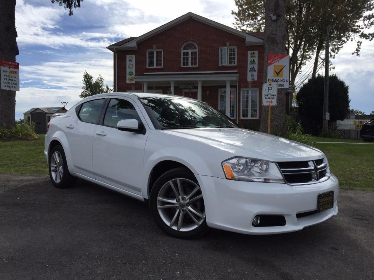 <p class=li1>This 2013 Dodge Avenger looks slick in a beautiful white exterior and comes equipped with Power Driver Seat, Heated Front Row Seats, CD/Mp3/AUX connectivity, Steering Wheel Audio Controls, Remote Trunk Release and many more features. Call 1-519-686-7253 or come visit us at 443 Exeter Rd.</p>
<ul>
<li class=li1><span class=s2>Voted&nbsp;<strong><em>#1 Best Used Car Dealership</em></strong>&nbsp;through 2014 - 2016 in London, Ontario</span></li>
<li class=li1><span class=s2>Voted&nbsp;<strong><em>Top Choice Award</em></strong>&nbsp;in 2015 and 2016</span></li>
<li class=li1><span class=s2>Voted&nbsp;<strong><em>London&rsquo;s Readers&rsquo; Choice Award</em></strong>&nbsp;2014 and 2015&nbsp;</span></li>
<li class=li1><span class=s2><strong><em>A+</em></strong><strong><em>Better Business Bureau rating</em></strong></span></li>
<li class=li1><span class=s2>We have been in business for&nbsp;</span><span class=s4><strong>27yrs</strong></span><span class=s2><strong><em>&nbsp;</em></strong></span></li>
<li class=li1><span class=s2>Most liked used car dealer on social media in Canada</span></li>
<li class=li1><span class=s2>We use an exclusive 3rd party tool that accurately monitors vehicle prices to guarantee our customers get the best value.&nbsp;</span></li>
<li class=li1><span class=s2><strong><em>NO NEED FOR HAGGLING!&nbsp;</em></strong></span></li>
<li class=li1><span class=s2><strong><em>NO HIDDEN ADMIN. FEES!</em></strong></span></li>
<li class=li1><span class=s2><strong><em>Just honesty and integrity at no additional charge</em></strong></span></li>
<li class=li1><span class=s2>All vehicles:</span></li>
<ul>
<li class=li1><span class=s2>Go through Safety inspection with 30 days 100% safety related items warranty completed by us</span></li>
<li class=li1><span class=s2>With below 50% brakes will be replaced&nbsp;</span></li>
<li class=li1><span class=s2>Receive a semi-synthetic oil-lube-filter</span></li>
<li class=li1><span class=s2>Undergo Emissions test and an extensive inspection</span></li>
<li class=li1><span class=s2>Include a FREE CarProof Report</span></li>
<li class=li2><span class=s2>Purchased include FREE cleanup and detailing</span></li>
</ul>
<li class=li2><span class=s2>Our&nbsp;<em>Finance Specialists</em>&nbsp;will do their best to:</span></li>
<ul>
<li class=li2><span class=s2>Provide&nbsp;<strong><em>SAME-DAY APPROVALS</em></strong></span></li>
<li class=li2><span class=s2>Ensure achieving the&nbsp;<strong><em>LOWEST INTEREST RATE &</em></strong>&nbsp;<strong><em>BEST TERMS&nbsp;</em></strong>possible</span></li>
<li class=li2><span class=s2>Provide&nbsp;<strong><em>FULLY OPEN-END LOANS *pay them off any time with no penalty*</em></strong></span></li>
</ul>
<li class=li3><span class=s2>Whether its good, bad or no credit, bankruptcy, proposal, divorce or repossessions. $0 down Apply securely with confidence at&nbsp;<a href=http://bit.ly/2cg4WeM><span class=s5>http://bit.ly/2cg4WeM</span></a></span><span class=s6>&nbsp;</span></li>
<li class=li3><span class=s2>We make the buying process SIMPLE and STRESS-FREE, our reviews speak for themselves:</span></li>
<ul>
<li class=li4><span class=s8><strong><em>Google</em></strong><em>:</em></span><span class=s9><a href=http://bit.ly/2cK4fi3><span class=s10>http://bit.ly/2cK4fi3</span></a></span></li>
<li class=li5><span class=s8><strong><em>DealerRater:</em></strong></span><span class=s12><a href=http://bit.ly/2cIdFI1><span class=s5>http://bit.ly/2cIdFI1</span></a></span></li>
<li class=li5><span class=s8><strong><em>N49.com:</em></strong></span><span class=s12><a href=http://bit.ly/2bYZlOh><span class=s5>http://bit.ly/2bYZlOh</span></a></span></li>
<li class=li5><span class=s8><strong><em>BBB:</em></strong></span><span class=s9>&nbsp;<a href=http://go.bbb.org/2cK5Cxd><span class=s5>http://go.bbb.org/2cK5Cxd</span></a></span></li>
</ul>
</ul>
<p>&nbsp;</p>
<p class=p6><span class=s2>**Payments are based off qualifying monthly term $0 down & 4.9% interest. Qualifying term and rate of borrowing varies by lender. Example: The cost of borrowing on a vehicle with a purchase price of $10000 at 4.9% over 60 month term is $1499.78. Rates are subject to change without notice.&nbsp;</span></p>
