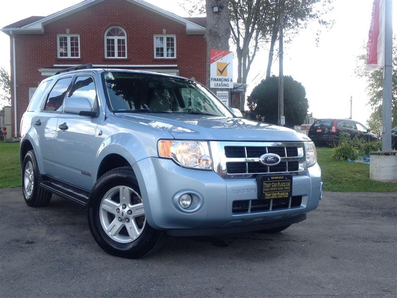 Save the environment and come in today to test drive this 2008 Ford Hybrid Escape. This vehicle offers but is not limited to Back Up Senors Heated Beige Leather Seats Roof Rack Cruise Control Fog Lights Family Road Trips Keyless Entry Fuel Efficient and much more. Come in today to start you adventure.Drive this vehicle for $60 Wkly for 60 months $0 down & 4.9% interest.That Car Place has been in business for over 25 years voted #1 Best Used Car Dealership in London Ontario for 2014 and 2015 Top Choice Award for 2015 as well as Londons Readers Choice Award 2015 winner in 5 different categories including Favourite Domestic and Import Used Car Dealership. That Car Place holds a solid A Better Business Bureau rating and achieved the most likes on social media ever in the used car dealership category. We offer guaranteed customer satisfaction including no price haggle providing delivery anywhere in CANADA! Our reviews speak for themselves. httpthatcarplace.careviews2Our friendly and welcoming environment provides you with the greatest service with no hassle no pressured sales and no obligations. If you are not happy neither are we!With over 150 of quality handpicked vehicles in stock to present the greatest selection and variety. We at That Car Place are committed to achieving a 100% approval with the best interest rates and affordable payments to fit your budget every single time. Our Finance Specialists provides same day approvals and work hard 247 to ensure achieving the lowest interest rate possible best terms and fully open end loans. Minimum qualifications. Whether its Good credit Bad credit No Credit Bankruptcy Proposal Divorce repossessions $0 down or simply low affordable payments we can get it done for you.If That Car Place cannot get you Financing Nobody can... Apply securely with confidence at httpthatcarplace.caapplyVisit us ThatCarPlace.ca at 443 Exeter Road London Ontario or call us 519686SALE (7253) or toll free 18669691999 or by email sales@thatcarplace.ca