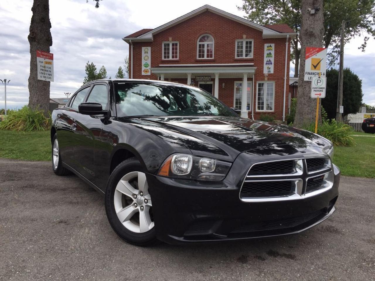 <p>This 2014 Dodge Charger has a CLEAN CARPROOF and offers one smooth ride with a nice V6 Engine. It also has Power Driver Seats, Push Button Start, USB/AUX/CD/Mp3 connectivity for your iPod/iPhone or Android music playing device. Power Windows/Doors/Locks/Mirrors, a spacious trunk and roomy interior plus many more features. Call 1-519-686-7253 or Visit 443 Exeter Rd.</p>
<ul>
<li class=li1><span class=s2>Voted&nbsp;<strong><em>#1 Best Used Car Dealership</em></strong>&nbsp;through 2014 - 2016 in London, Ontario</span></li>
<li class=li1><span class=s2>Voted&nbsp;<strong><em>Top Choice Award</em></strong>&nbsp;in 2015 and 2016</span></li>
<li class=li1><span class=s2>Voted&nbsp;<strong><em>London&rsquo;s Readers&rsquo; Choice Award</em></strong>&nbsp;2014 and 2015&nbsp;</span></li>
<li class=li1><span class=s2><strong><em>A+</em></strong><strong><em>Better Business Bureau rating</em></strong></span></li>
<li class=li1><span class=s2>We have been in business for&nbsp;</span><span class=s4><strong>27yrs</strong></span><span class=s2><strong><em>&nbsp;</em></strong></span></li>
<li class=li1><span class=s2>Most liked used car dealer on social media in Canada</span></li>
<li class=li1><span class=s2>We use an exclusive 3rd party tool that accurately monitors vehicle prices to guarantee our customers get the best value.&nbsp;</span></li>
<li class=li1><span class=s2><strong><em>NO NEED FOR HAGGLING!&nbsp;</em></strong></span></li>
<li class=li1><span class=s2><strong><em>NO HIDDEN ADMIN. FEES!</em></strong></span></li>
<li class=li1><span class=s2><strong><em>Just honesty and integrity at no additional charge</em></strong></span></li>
<li class=li1><span class=s2>All vehicles:</span></li>
<ul>
<li class=li1><span class=s2>Go through Safety inspection with 30 days 100% safety related items warranty completed by us</span></li>
<li class=li1><span class=s2>With below 50% brakes will be replaced&nbsp;</span></li>
<li class=li1><span class=s2>Receive a semi-synthetic oil-lube-filter</span></li>
<li class=li1><span class=s2>Undergo Emissions test and an extensive inspection</span></li>
<li class=li1><span class=s2>Include a FREE CarProof Report</span></li>
<li class=li2><span class=s2>Purchased include FREE cleanup and detailing</span></li>
</ul>
<li class=li2><span class=s2>Our&nbsp;<em>Finance Specialists</em>&nbsp;will do their best to:</span></li>
<ul>
<li class=li2><span class=s2>Provide&nbsp;<strong><em>SAME-DAY APPROVALS</em></strong></span></li>
<li class=li2><span class=s2>Ensure achieving the&nbsp;<strong><em>LOWEST INTEREST RATE &</em></strong>&nbsp;<strong><em>BEST TERMS&nbsp;</em></strong>possible</span></li>
<li class=li2><span class=s2>Provide&nbsp;<strong><em>FULLY OPEN-END LOANS *pay them off any time with no penalty*</em></strong></span></li>
</ul>
<li class=li3><span class=s2>Whether its good, bad or no credit, bankruptcy, proposal, divorce or repossessions. $0 down Apply securely with confidence at&nbsp;<a href=http://bit.ly/2cg4WeM><span class=s5>http://bit.ly/2cg4WeM</span></a></span><span class=s6>&nbsp;</span></li>
<li class=li3><span class=s2>We make the buying process SIMPLE and STRESS-FREE, our reviews speak for themselves:</span></li>
<ul>
<li class=li4><span class=s8><strong><em>Google</em></strong><em>:</em></span><span class=s9><a href=http://bit.ly/2cK4fi3><span class=s10>http://bit.ly/2cK4fi3</span></a></span></li>
<li class=li5><span class=s8><strong><em>DealerRater:</em></strong></span><span class=s12><a href=http://bit.ly/2cIdFI1><span class=s5>http://bit.ly/2cIdFI1</span></a></span></li>
<li class=li5><span class=s8><strong><em>N49.com:</em></strong></span><span class=s12><a href=http://bit.ly/2bYZlOh><span class=s5>http://bit.ly/2bYZlOh</span></a></span></li>
<li class=li5><span class=s8><strong><em>BBB:</em></strong></span><span class=s9>&nbsp;<a href=http://go.bbb.org/2cK5Cxd><span class=s5>http://go.bbb.org/2cK5Cxd</span></a></span></li>
</ul>
</ul>
<p>&nbsp;**Payments are based off qualifying monthly term $0 down & 4.9% interest. Qualifying term and rate of borrowing varies by lender. Example: The cost of borrowing on a vehicle with a purchase price of $10000 at 4.9% over 60 month term is $1499.78. Rates are subject to change without notice.&nbsp;</p>