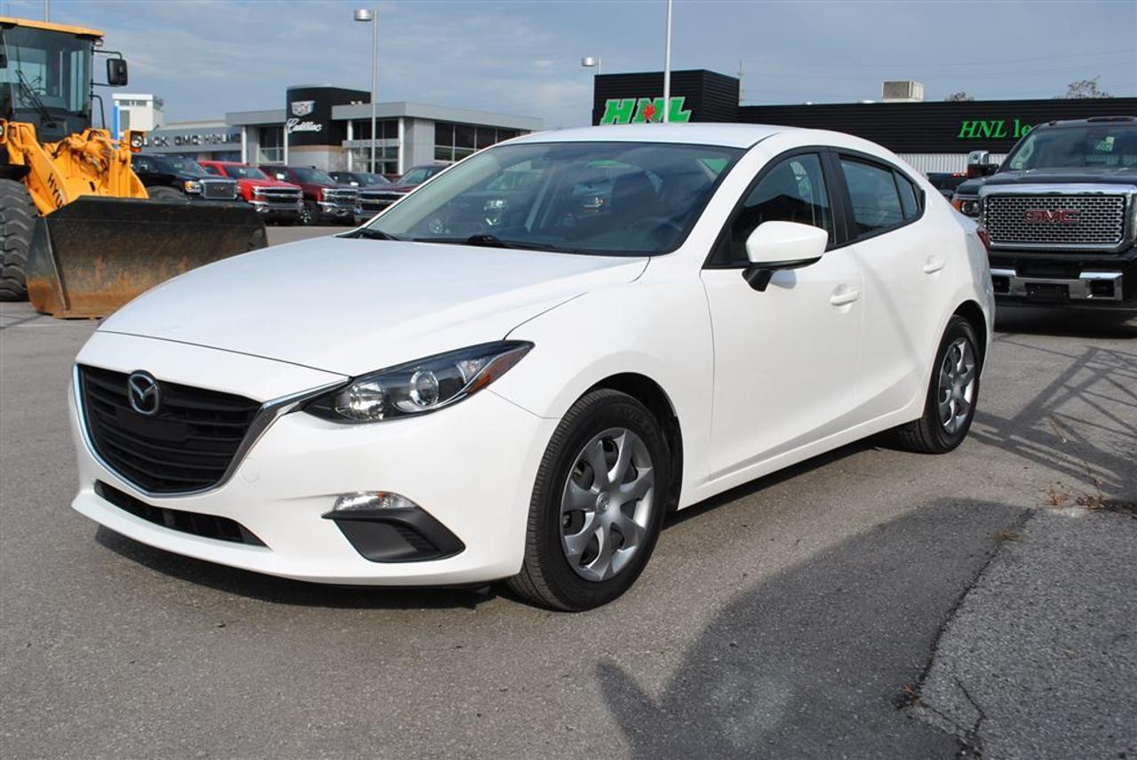 2014 MAZDA 3 - SKYACTIV ENGINE - GREAT COLOUR COMBO - WHITE ON BLACK - AUTOMATIC TRANSMISSION -- ONLY 32KM ! ICE COLD A/C - BLUETOOTH -LOADED WITH OPTIONS!! $99 Bi-Weekly payments ! *** WE DO NOT CHARGE FOR SAFETY & E-TEST !! ***This Mazda 3 SKYACTIV does more than service as basic transportation? The versatile 2014 Mazda 3 offers powerful yet fuel-efficient engines, sporty driving dynamics and a comfortable ride. For 2014, the Mazda3 gets a completely new look and architecture to celebrate its divorce from the Blue Oval. The compact hatchback and sedan now features the entirety of Mazdas SkyActiv technologies to provide a new level of efficiency while bolstering the connection between driver and car.  Now Only $13,495 plus HST CERTIFIED AND E-TESTED PASS - YES WE FINANCE !! rates as low as 4.79% o.a.c., - YOU DONT NEED PERFECT CREDIT TO GET A VEHICLE AT AURORA AUTO WHOLESALERS - WE FINANCE EVERYONE!! - Good Credit, Bad Credit, No Credit or New to Country! We WILL get you financed at Excellent Rates as LOW AS **4.65% o.a.c Special Financing and NO Payments for 6 Months. Flexible Terms and Rates tailored to your specific situation. Established in 2001, Aurora Auto Wholesalers has sold THOUSANDS of quality vehicles to customers throughout the GTA. We specialize in off-lease corporate cars, vans and SUVs as well as fleet vehicles. We offer extended warranties and financing as low as 4.65%. ( $99 bi-weekly payments with $1800 down over 72 month term - cost of borrowing $1987 ) Aurora Auto is OMVIC and UCDA registered and our team takes pride in offering a hassle free experience. ***Please call 1-844-339-0458 to book your appointment today. *** Aurora Auto Wholesalers inc. 15699 Yonge St, Aurora, Ontario *****