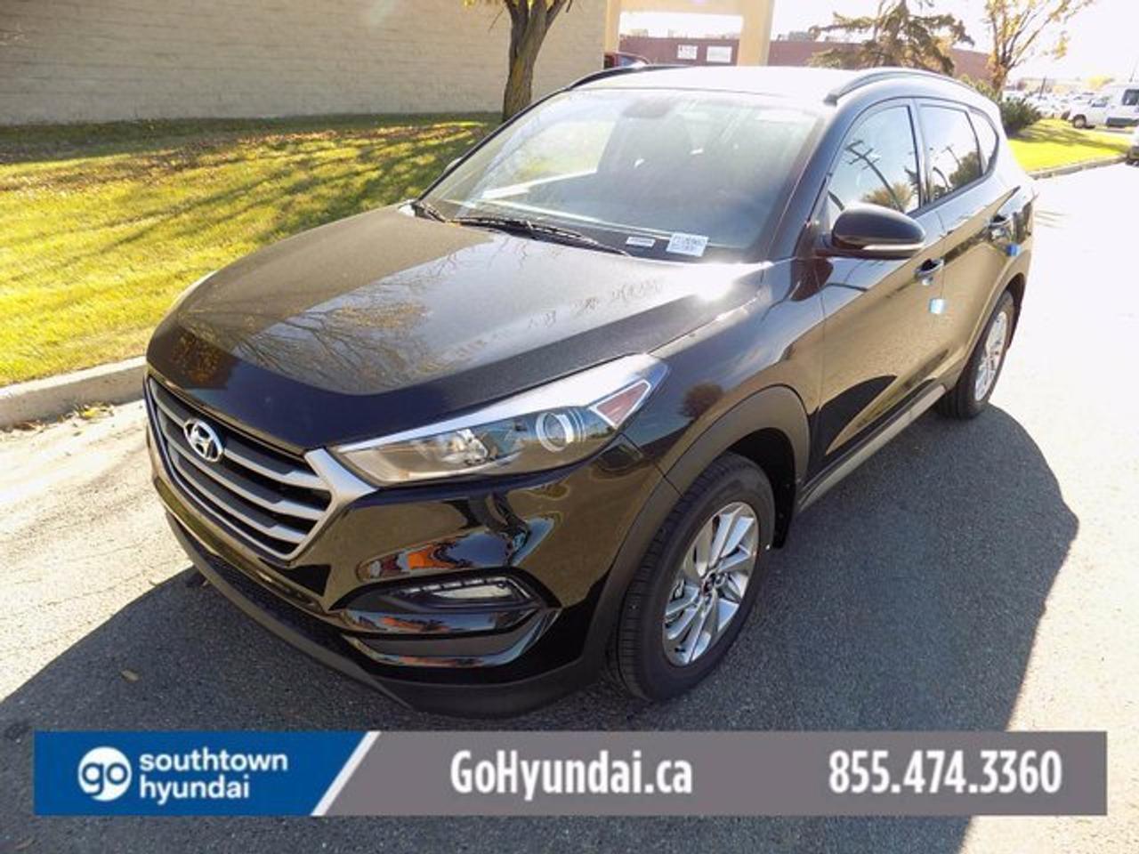 <p class=MsoNormal style=text-align: center; align=center><span style=font-size: 12.0pt; line-height: 107%; font-family: Arial,sans-serif;>Drive away in a 2017 Tucson SE 2.0L AWD with a 6 speed automatic transmission. With The 2.0L 4 cylinder gdi engine you can indulge in the freedom of the open road.</span></p> <p class=MsoNormal style=text-align: center; align=center><span style=font-size: 12.0pt; line-height: 107%; font-family: Arial,sans-serif;>Enjoy the luxury and convenience of dual zone automatic temperature control, Bluetooth hands-free phone system, with mounted audio, cruise and phone controls on a heated steering wheel. Heated front and rear leather seats and a windshield wiper de-icer help combat winter&rsquo;s icy sting.&nbsp; Park with extra confidence thanks to a rear view camera displayed on the 5.0 inch touch screen in the center console. Do not forget to take a moment to enjoy the view throw the massive panoramic sunroof.</span></p> <p class=MsoNormal style=text-align: center; align=center><span style=font-size: 12.0pt; line-height: 107%; font-family: Arial,sans-serif;>Drive confidently with peace of mind standard safety features included. Six airbags advanced front airbags; front seat-mounted side airbags and roof mounted side curtain with rollover sensor; antilock braking system with electronic brake-force distribution and electronic stability control with traction control.</span></p> <p class=MsoNormal style=text-align: center; align=center><span style=font-size: 12.0pt; line-height: 107%; font-family: Arial,sans-serif;>With a blind spot detection system with lane change assist and rear cross traffic alert the Tucson SE helps you watch your back.</span></p> <p class=MsoNormal style=text-align: center; align=center><span style=font-size: 12.0pt; line-height: 107%; font-family: Arial,sans-serif;>&nbsp;</span></p> <p class=MsoNormal style=mso-margin-top-alt: auto; mso-margin-bottom-alt: auto; text-align: center; line-height: normal; align=center><strong><span style=font-size: 10pt; font-family: Verdana, sans-serif;>SALE PRICE IS NET OF DEALER CASH INCENTIVE</span></strong></p> <p class=MsoNormal style=mso-margin-top-alt: auto; mso-margin-bottom-alt: auto; text-align: center; line-height: normal; align=center><strong><span style=font-size: 13.5pt; font-family: Verdana, sans-serif;>The Tucson comes in many trim levels. We have an excellent internet sales team that would love to provide you with more information; please contact us at 780-450-1021 or email info@southtownhyundai.com, we are more than Happy to Help!</span></strong></p> <p class=MsoNormal style=mso-margin-top-alt: auto; mso-margin-bottom-alt: auto; text-align: center; line-height: normal; align=center><span style=font-size: 7.5pt; font-family: Verdana, sans-serif;>If you want people who care for your needs and wants, call our internet sales team!&nbsp;Buy with confidence, all NEW vehicles from Southtown Hyundai are backed by our incredible 5year/100,000kms comprehensive warranty!</span></p> <p>&nbsp;</p> <p class=MsoNormal style=mso-margin-top-alt: auto; mso-margin-bottom-alt: auto; text-align: center; line-height: normal; align=center><span style=font-size: 7.5pt; font-family: Verdana, sans-serif;>Proudly serving Edmonton, Redwater, Rimbey, Camrose, Lloydminster, Vegreville, Beaumont, Ft. Saskatchewan, Ft. McMurray, Toefield, Wetaskiwin, Drayton Valley, and Provost!</span></p>
