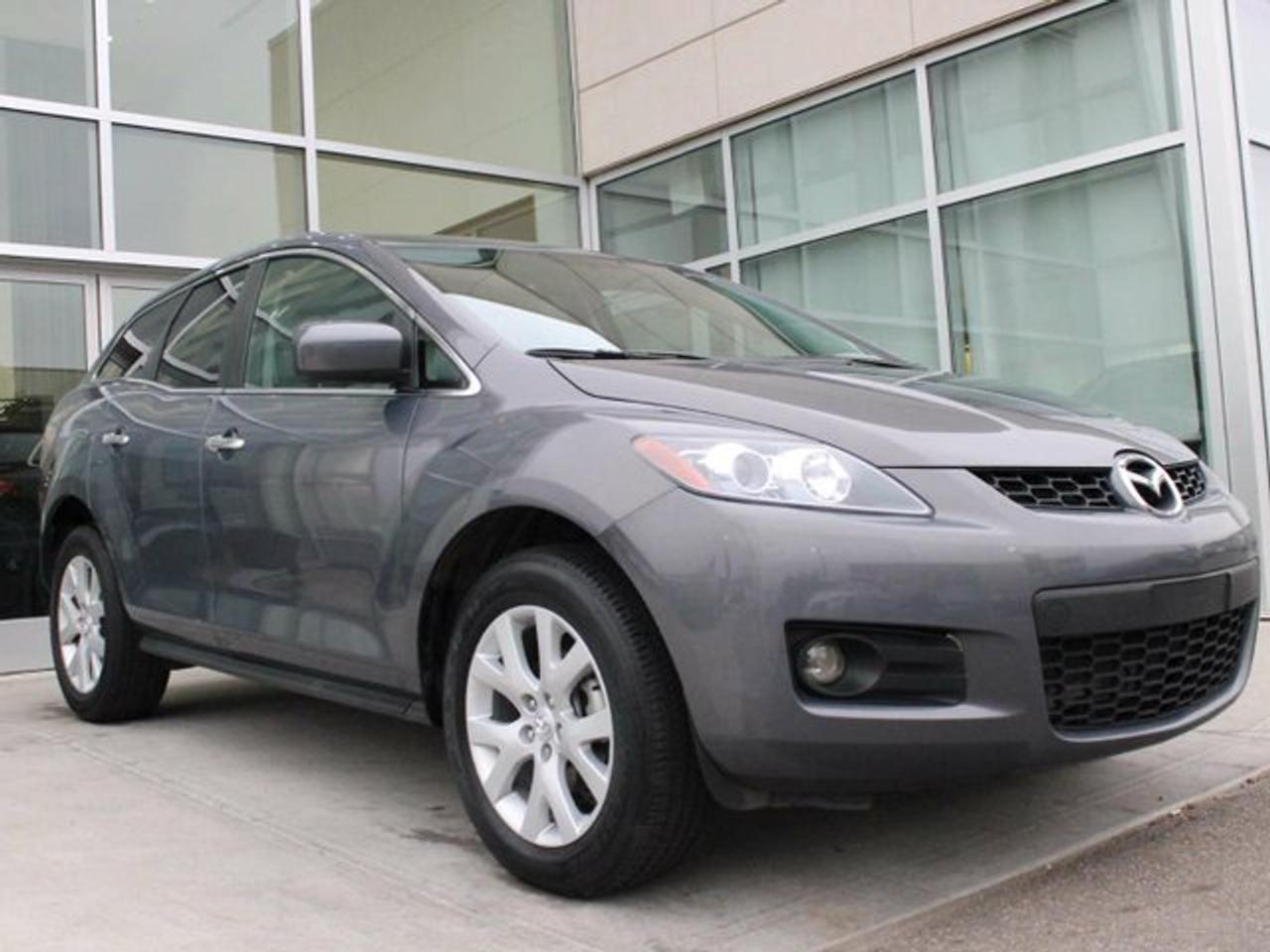 <p>This 2008 Mazda&nbsp;CX-7 GT is extremely clean and full of great features like leather seating, sun roof, heated front seats! Not only is this one full of comfort, it is even more full of safety features as well.&nbsp;The CX-7 has a roomy interior and excellent handling and is powered by a 2.3 Liter 4 Cylinder engine that returns good fuel economy! Stop in and check out this CX-7 today!</p> <p><span lang=EN><span>Ericksen Infiniti17616-111 Avenue. AMVIC Licensed.</span></span></p> <p>&nbsp;</p> <p>&nbsp;</p> <p class=MsoNormal><span lang=EN><span lang=EN><strong><em>FOR IMMEDIATE RESPONSE, CALL OR TEXT SAM ANYTIME @ 780-221-9755 FOR MORE INFORMATION OR TO BOOK A DEMONSTRATION DRIVE!</em></strong></span></span></p> <p><strong><span>NO HASSLE PRE-OWNED PURCHASE EXPERIENCE</span></strong></p> <p>&nbsp;</p> <p><span lang=EN><span>All of our pre-owned vehicles are priced to market value which takes the guess work out of purchasing a pre-owned vehicle and ensuring you get the best price</span></span></p> <p>&nbsp;</p> <p>&nbsp;</p> <p>&nbsp;</p> <div align=center><hr align=center size=0 width=100% /></div> <p><strong><span>THE BENEFITS OF BUYING PRE-OWNED AT ERICKSEN INFINITI</span></strong></p> <ul type=disc> <li><span>Luxury Service Loaners</span></li> <li><span>Best in class vehicle reconditioning standards</span></li> <li><span>Fully Inspected and Approved by our Certified Technicians</span></li> <li><span>AMVIC Mechanical Fitness Assessment Provided</span></li> <li><span>CarProof Verified</span></li> <li><span>All vehicles include a minimum</span><span> 3 month / 5000km warranty </span></li> <li><strong><span>Fixed Commission</span></strong><span> <strong>sales people</strong><br /> Our sales staff are compensated on two categories:</span></li> <ol type=1 start=1> <li><span>To find the right vehicle for you</span></li> <li><span>The feedback you provide regarding your purchase experience.</span></li> </ol></ul> <p>&nbsp;</p> <p class=MsoNormal>&nbsp;</p> <p>&nbsp;</p> <p>&nbsp;</p> <p>&nbsp;</p>
