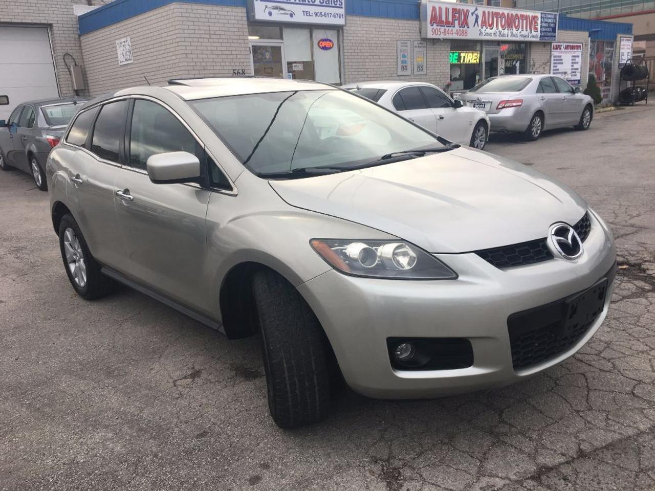 2007 Mazda CX-7 GT All wheel drive , Leather, Tinted Window, Power seats,Power sun roof , and so many power options, non smoker unit . tires are in good shape . has book .has service record, super clean interior and exterior. well kept and maintained . fully detailed .
our price includes :
1-Ontario Safety Standard Certificate .
2-Vehicle Emission Test .
3-CARPROOF Vehicle History Report.

ALL CREDIT WELCOME? FINANCING AVAILABLE...

-Safety Guarantee 36 days.
To make sure that the vehicle is still available, please call us at:905 617 6761 or by email: rotana.sales@hotmail.com.com

-OUR HOURS OF OPERATION:
MON-FRI: 9:00 am to 8:00 PM
SAT: 9:00 am to 6:00 PM
SUN: CLOSED and By Appointment
Rotana Auto Sales
568 Argus Rd
Oakville , On , L6J 3J3
Phone: 905 617 6761
Cell : 416 822 2870
rotana.sales@hotmail.com