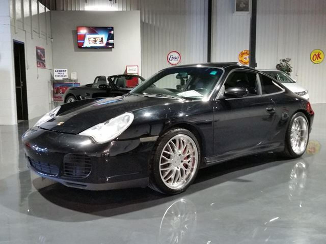LOCALLY OWNED CAR!   YES A 911 PORSCHE AWD WIDEBODY WITH SUPER SWEET WHEELS, FULL LEATHER INTERIOR, INCLUDES LEATHER DASH, SUEDE HEADLINER, POWER WAILTAIL, POWER MOONROOF, 6 SPD ROCKET TRANSMISSSION. NEW CLUTCH AND DRIVES AMAZING, BEST PRICE ON A C4S IN CANADA, DRIVETIMEOTTAWA.COM, DRIVE4LESS. *TAXES AND LICENSE EXTRA. COME VISIT US/VENEZ NOUS VISITER!