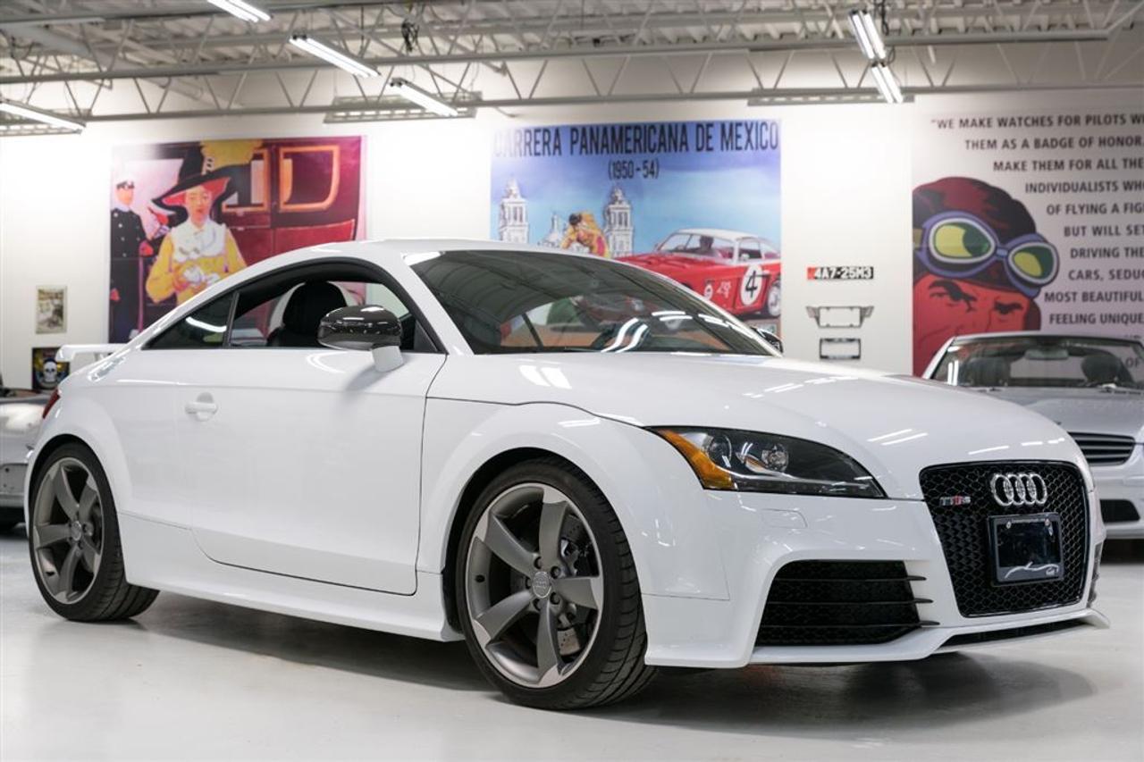 Just traded in! Local, one owner, stored winters, obviously! Properly serviced, original, no flaws. Updated brake pads from Audi. (no squeak!). 3.9% financing oac. Owner Reviews;Perfect combination of performance, all-wheel drive, and fuel efficiency. Has two small seats in rear and hatchback that is a plus if/when shopping. With limited importation into Canada and the US, the TTRS will also become a collectors item.Iif youre looking for a coupe sports car this checks all the boxes and then some. all-season driveability and a huge trunk you can carry a lot of stuff in thanks to the rear hatch. insane amounts of power to be had from this 5 cylinder engine as well. a real gem.