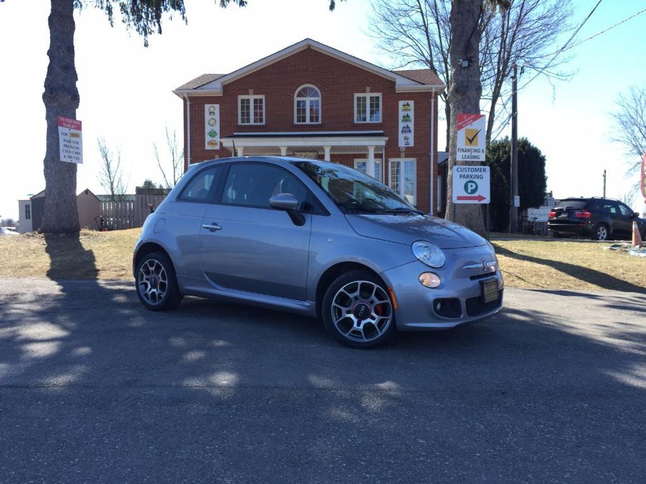 <p>This 2015 Fiat 500 Coupe comes nicely equipped with BLUETOOTH, USB/AUX connectivity for your IPOD/IPHONE or ANDROID music playing device, Steering Wheel Audio Controls, Cruise Control, Cargo Shade and many more features. This vehicle was previously used as a daily rental. Call 1-519-686-7253 or Visit 443 Exeter Rd. That Car Place!!!</p>
<ul>
<li class=li1><span class=s2>Voted&nbsp;<strong><em>#1 Best Used Car Dealership</em></strong>&nbsp;through 2014 - 2016 in London, Ontario</span></li>
<li class=li1><span class=s2>Voted&nbsp;<strong><em>Top Choice Award</em></strong>&nbsp;in 2015 and 2016</span></li>
<li class=li1><span class=s2>Voted&nbsp;<strong><em>London&rsquo;s Readers&rsquo; Choice Award</em></strong>&nbsp;2014 and 2015&nbsp;</span></li>
<li class=li1><span class=s2><strong><em>A+</em></strong><strong><em>Better Business Bureau rating</em></strong></span></li>
<li class=li1><span class=s2>We have been in business for&nbsp;</span><span class=s4><strong>27yrs</strong></span><span class=s2><strong><em>&nbsp;</em></strong></span></li>
<li class=li1><span class=s2>Most liked used car dealer on social media in Canada</span></li>
<li class=li1><span class=s2>We use an exclusive 3rd party tool that accurately monitors vehicle prices to guarantee our customers get the best value.&nbsp;</span></li>
<li class=li1><span class=s2><strong><em>NO NEED FOR HAGGLING!&nbsp;</em></strong></span></li>
<li class=li1><span class=s2><strong><em>NO HIDDEN ADMIN. FEES!</em></strong></span></li>
<li class=li1><span class=s2><strong><em>Just honesty and integrity at no additional charge</em></strong></span></li>
<li class=li1><span class=s2>All vehicles:</span></li>
<ul>
<li class=li1><span class=s2>Go through Safety inspection with 30 days 100% safety related items warranty completed by us</span></li>
<li class=li1><span class=s2>With below 50% brakes will be replaced&nbsp;</span></li>
<li class=li1><span class=s2>Receive a semi-synthetic oil-lube-filter</span></li>
<li class=li1><span class=s2>Undergo Emissions test and an extensive inspection</span></li>
<li class=li1><span class=s2>Include a FREE CarProof Report</span></li>
<li class=li2><span class=s2>Purchased include FREE cleanup and detailing</span></li>
</ul>
<li class=li2><span class=s2>Our&nbsp;<em>Finance Specialists</em>&nbsp;will do their best to:</span></li>
<ul>
<li class=li2><span class=s2>Provide&nbsp;<strong><em>SAME-DAY APPROVALS</em></strong></span></li>
<li class=li2><span class=s2>Ensure achieving the&nbsp;<strong><em>LOWEST INTEREST RATE &</em></strong>&nbsp;<strong><em>BEST TERMS&nbsp;</em></strong>possible</span></li>
<li class=li2><span class=s2>Provide&nbsp;<strong><em>FULLY OPEN-END LOANS *pay them off any time with no penalty*</em></strong></span></li>
</ul>
<li class=li3><span class=s2>Whether its good, bad or no credit, bankruptcy, proposal, divorce or repossessions. $0 down Apply securely with confidence at&nbsp;<a href=http://bit.ly/2cg4WeM><span class=s5>http://bit.ly/2cg4WeM</span></a></span><span class=s6>&nbsp;</span></li>
<li class=li3><span class=s2>We make the buying process SIMPLE and STRESS-FREE, our reviews speak for themselves:</span></li>
<ul>
<li class=li4><span class=s8><strong><em>Google</em></strong><em>:</em></span><span class=s9><a href=http://bit.ly/2cK4fi3><span class=s10>http://bit.ly/2cK4fi3</span></a></span></li>
<li class=li5><span class=s8><strong><em>DealerRater:</em></strong></span><span class=s12><a href=http://bit.ly/2cIdFI1><span class=s5>http://bit.ly/2cIdFI1</span></a></span></li>
<li class=li5><span class=s8><strong><em>N49.com:</em></strong></span><span class=s12><a href=http://bit.ly/2bYZlOh><span class=s5>http://bit.ly/2bYZlOh</span></a></span></li>
<li class=li5><span class=s8><strong><em>BBB:</em></strong></span><span class=s9>&nbsp;<a href=http://go.bbb.org/2cK5Cxd><span class=s5>http://go.bbb.org/2cK5Cxd</span></a></span></li>
</ul>
</ul>
<p>&nbsp;**Payments are based off qualifying monthly term $0 down & 4.9% interest. Qualifying term and rate of borrowing varies by lender. Example: The cost of borrowing on a vehicle with a purchase price of $10000 at 4.9% over 60 month term is $1499.78. Rates are subject to change without notice.&nbsp;</p>