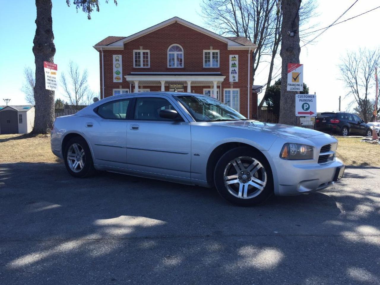 <p>This 2006 Dodge Charger SXT WONT LAST LONG!!! Comes with V6 3.5L High Output Engine, Cruise, Power Leather Driver Seat with Leather interior, AUX/CD connectivity for your IPOD/IPHONE or ANDROID music playing device and many more features. Priced to sell at only $6981 + Licensing + Tax. This sweet car comes nicely equipped. Call 1-519-686-7253 or Visit 443 Exeter Rd. That Car Place</p>
<ul>
<li class=li1><span class=s2>Voted&nbsp;<strong><em>#1 Best Used Car Dealership</em></strong>&nbsp;through 2014 - 2016 in London, Ontario</span></li>
<li class=li1><span class=s2>Voted&nbsp;<strong><em>Top Choice Award</em></strong>&nbsp;in 2015 and 2016</span></li>
<li class=li1><span class=s2>Voted&nbsp;<strong><em>London&rsquo;s Readers&rsquo; Choice Award</em></strong>&nbsp;2014 and 2015&nbsp;</span></li>
<li class=li1><span class=s2><strong><em>A+</em></strong><strong><em>Better Business Bureau rating</em></strong></span></li>
<li class=li1><span class=s2>We have been in business for&nbsp;</span><span class=s4><strong>27yrs</strong></span><span class=s2><strong><em>&nbsp;</em></strong></span></li>
<li class=li1><span class=s2>Most liked used car dealer on social media in Canada</span></li>
<li class=li1><span class=s2>We use an exclusive 3rd party tool that accurately monitors vehicle prices to guarantee our customers get the best value.&nbsp;</span></li>
<li class=li1><span class=s2><strong><em>NO NEED FOR HAGGLING!&nbsp;</em></strong></span></li>
<li class=li1><span class=s2><strong><em>NO HIDDEN ADMIN. FEES!</em></strong></span></li>
<li class=li1><span class=s2><strong><em>Just honesty and integrity at no additional charge</em></strong></span></li>
<li class=li1><span class=s2>All vehicles:</span></li>
<ul>
<li class=li1><span class=s2>Go through Safety inspection with 30 days 100% safety related items warranty completed by us</span></li>
<li class=li1><span class=s2>With below 50% brakes will be replaced&nbsp;</span></li>
<li class=li1><span class=s2>Receive a semi-synthetic oil-lube-filter</span></li>
<li class=li1><span class=s2>Undergo Emissions test and an extensive inspection</span></li>
<li class=li1><span class=s2>Include a FREE CarProof Report</span></li>
<li class=li2><span class=s2>Purchased include FREE cleanup and detailing</span></li>
</ul>
<li class=li2><span class=s2>Our&nbsp;<em>Finance Specialists</em>&nbsp;will do their best to:</span></li>
<ul>
<li class=li2><span class=s2>Provide&nbsp;<strong><em>SAME-DAY APPROVALS</em></strong></span></li>
<li class=li2><span class=s2>Ensure achieving the&nbsp;<strong><em>LOWEST INTEREST RATE &</em></strong>&nbsp;<strong><em>BEST TERMS&nbsp;</em></strong>possible</span></li>
<li class=li2><span class=s2>Provide&nbsp;<strong><em>FULLY OPEN-END LOANS *pay them off any time with no penalty*</em></strong></span></li>
</ul>
<li class=li3><span class=s2>Whether its good, bad or no credit, bankruptcy, proposal, divorce or repossessions. $0 down Apply securely with confidence at&nbsp;<a href=http://bit.ly/2cg4WeM><span class=s5>http://bit.ly/2cg4WeM</span></a></span><span class=s6>&nbsp;</span></li>
<li class=li3><span class=s2>We make the buying process SIMPLE and STRESS-FREE, our reviews speak for themselves:</span></li>
<ul>
<li class=li4><span class=s8><strong><em>Google</em></strong><em>:</em></span><span class=s9><a href=http://bit.ly/2cK4fi3><span class=s10>http://bit.ly/2cK4fi3</span></a></span></li>
<li class=li5><span class=s8><strong><em>DealerRater:</em></strong></span><span class=s12><a href=http://bit.ly/2cIdFI1><span class=s5>http://bit.ly/2cIdFI1</span></a></span></li>
<li class=li5><span class=s8><strong><em>N49.com:</em></strong></span><span class=s12><a href=http://bit.ly/2bYZlOh><span class=s5>http://bit.ly/2bYZlOh</span></a></span></li>
<li class=li5><span class=s8><strong><em>BBB:</em></strong></span><span class=s9>&nbsp;<a href=http://go.bbb.org/2cK5Cxd><span class=s5>http://go.bbb.org/2cK5Cxd</span></a></span></li>
</ul>
</ul>
<p>&nbsp;**Payments are based off qualifying monthly term $0 down & 4.9% interest. Qualifying term and rate of borrowing varies by lender. Example: The cost of borrowing on a vehicle with a purchase price of $10000 at 4.9% over 60 month term is $1499.78. Rates are subject to change without notice.&nbsp;</p>