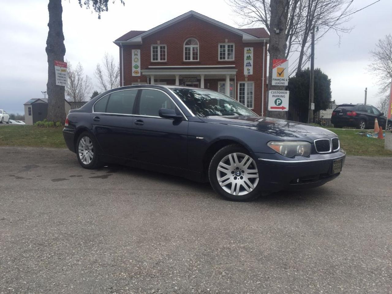 <p>This 2003 BMW 745i has a CLEAN CARPROOF, packs a V8 and has NAVIGATION, REAR SENSORS, SUNROOF, POWER LEATHER SEATS, DRIVER MEMORY POWERED SEAT, BLUETOOTH, HEATED STEERING WHEEL, WOODGRAIN INTERIOR TRIM, SCREEN SHADE PROTECTORS IN TRUNK AND 2ND ROW WINDOWS, EXTREMELY SPACIOUS INTERIOR WITH TONS OF LEGROOM IN 2ND ROW, PUSH START and more. Absolutely loaded and ONLY ONE AVAILABLE. Wont Last Long!!! ONLY $9987 + HST + LICENSING. Call 1-519-686-7253 or Visit 443 Exeter Rd. That Car Place.&nbsp;</p>
<ul>
<li class=li1><span class=s2>Voted&nbsp;<strong><em>#1 Best Used Car Dealership</em></strong>&nbsp;through 2014 - 2017 (4 yrs) in London, Ontario</span></li>
<li class=li1><span class=s2>Voted&nbsp;<strong><em>Top Choice Award</em></strong>&nbsp;in 2015 - 2017 (3 yrs)</span></li>
<li class=li1><span class=s2>Voted&nbsp;<strong><em>London&rsquo;s Readers&rsquo; Choice Award</em></strong>&nbsp;2014 and 2015&nbsp;</span></li>
<li class=li1><span class=s2><strong><em>A+</em></strong><strong><em>Better Business Bureau rating</em></strong></span></li>
<li class=li1><span class=s2>We have been in business for&nbsp;</span><span class=s4><strong>27yrs</strong></span><span class=s2><strong><em>&nbsp;</em></strong></span></li>
<li class=li1><span class=s2>Most liked used car dealer on social media in Canada</span></li>
<li class=li1><span class=s2>We use an exclusive 3rd party tool that accurately monitors vehicle prices to guarantee our customers get the best value.&nbsp;</span></li>
<li class=li1><span class=s2><strong><em>NO NEED FOR HAGGLING!&nbsp;</em></strong></span></li>
<li class=li1><span class=s2><strong><em>NO HIDDEN ADMIN. FEES!</em></strong></span></li>
<li class=li1><span class=s2><strong><em>Just honesty and integrity at no additional charge</em></strong></span></li>
<li class=li1><span class=s2>All vehicles:</span></li>
<ul>
<li class=li1><span class=s2>Go through Safety inspection with 30 days 100% safety related items warranty completed by us</span></li>
<li class=li1><span class=s2>With below 50% brakes will be replaced&nbsp;</span></li>
<li class=li1><span class=s2>Receive a semi-synthetic oil-lube-filter</span></li>
<li class=li1><span class=s2>Undergo Emissions test and an extensive inspection</span></li>
<li class=li1><span class=s2>Include a FREE CarProof Report</span></li>
<li class=li2><span class=s2>Purchased include FREE cleanup and detailing</span></li>
</ul>
<li class=li2><span class=s2>Our&nbsp;<em>Finance Specialists</em>&nbsp;will do their best to:</span></li>
<ul>
<li class=li2><span class=s2>Provide&nbsp;<strong><em>SAME-DAY APPROVALS</em></strong></span></li>
<li class=li2><span class=s2>Ensure achieving the&nbsp;<strong><em>LOWEST INTEREST RATE &</em></strong>&nbsp;<strong><em>BEST TERMS&nbsp;</em></strong>possible</span></li>
<li class=li2><span class=s2>Provide&nbsp;<strong><em>FULLY OPEN-END LOANS *pay them off any time with no penalty*</em></strong></span></li>
</ul>
<li class=li3><span class=s2>Whether its good, bad or no credit, bankruptcy, proposal, divorce or repossessions. $0 down Apply securely with confidence at&nbsp;<a href=http://bit.ly/2cg4WeM><span class=s5>http://bit.ly/2cg4WeM</span></a></span><span class=s6>&nbsp;</span></li>
<li class=li3><span class=s2>We make the buying process SIMPLE and STRESS-FREE, our reviews speak for themselves:</span></li>
<ul>
<li class=li4><span class=s8><strong><em>Google</em></strong><em>:</em></span><span class=s9><a href=http://bit.ly/2cK4fi3><span class=s10>http://bit.ly/2cK4fi3</span></a></span></li>
<li class=li5><span class=s8><strong><em>DealerRater:</em></strong></span><span class=s12><span class=s5><a href=http://bit.ly/2cIdFI1>http://bit.ly/2cIdFI1</a></span></span></li>
<li class=li5><em><strong>Reviewsii:</strong></em><a style=text-indent: -18pt; href=http://bit.ly/2ot45Ar>http://bit.ly/2ot45Ar</a><span style=text-indent: -18pt;>&nbsp;&nbsp;</span></li>
<li class=li5><span class=s8><strong><em>BBB:</em></strong></span><span class=s9>&nbsp;<a href=http://go.bbb.org/2cK5Cxd><span class=s5>http://go.bbb.org/2cK5Cxd</span></a></span></li>
</ul>
</ul>
<p>&nbsp;**Payments are based off qualifying monthly term $0 down & 4.9% interest. Qualifying term and rate of borrowing varies by lender. Example: The cost of borrowing on a vehicle with a purchase price of $10000 at 4.9% over 60 month term is $1499.78. Rates are subject to change without notice.&nbsp;</p>
