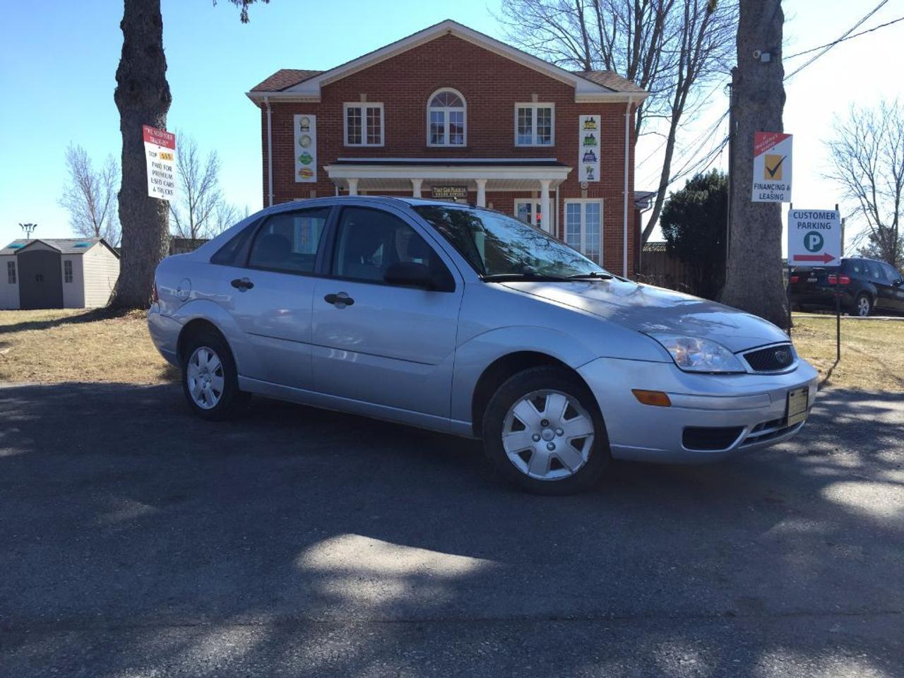<p class=MsoNormal>This 2007 Ford Focus SE is nicely equipped, priced to sell and is a great little fuel efficient sedan. Comes with Power Windows/Doors/Locks/Mirrors, Steering Wheel Audio Controls, Cruise Control, Automatic Transmission, CD/Mp3 player and has LOW KMs. Call 1-519-686-7253 or Visit 443 Exeter Rd. That Car Place</p>
<ul>
<li class=li1><span class=s2>Voted&nbsp;<strong><em>#1 Best Used Car Dealership</em></strong>&nbsp;through 2014 - 2017 (4 yrs) in London, Ontario</span></li>
<li class=li1><span class=s2>Voted&nbsp;<strong><em>Top Choice Award</em></strong>&nbsp;in 2015 - 2017 (3 yrs)</span></li>
<li class=li1><span class=s2>Voted&nbsp;<strong><em>London&rsquo;s Readers&rsquo; Choice Award</em></strong>&nbsp;2014 and 2015&nbsp;</span></li>
<li class=li1><span class=s2><strong><em>A+</em></strong><strong><em>Better Business Bureau rating</em></strong></span></li>
<li class=li1><span class=s2>We have been in business for&nbsp;</span><span class=s4><strong>27yrs</strong></span><span class=s2><strong><em>&nbsp;</em></strong></span></li>
<li class=li1><span class=s2>Most liked used car dealer on social media in Canada</span></li>
<li class=li1><span class=s2>We use an exclusive 3rd party tool that accurately monitors vehicle prices to guarantee our customers get the best value.&nbsp;</span></li>
<li class=li1><span class=s2><strong><em>NO NEED FOR HAGGLING!&nbsp;</em></strong></span></li>
<li class=li1><span class=s2><strong><em>NO HIDDEN ADMIN. FEES!</em></strong></span></li>
<li class=li1><span class=s2><strong><em>Just honesty and integrity at no additional charge</em></strong></span></li>
<li class=li1><span class=s2>All vehicles:</span></li>
<ul>
<li class=li1><span class=s2>Go through Safety inspection with 30 days 100% safety related items warranty completed by us</span></li>
<li class=li1><span class=s2>With below 50% brakes will be replaced&nbsp;</span></li>
<li class=li1><span class=s2>Receive a semi-synthetic oil-lube-filter</span></li>
<li class=li1><span class=s2>Undergo Emissions test and an extensive inspection</span></li>
<li class=li1><span class=s2>Include a FREE CarProof Report</span></li>
<li class=li2><span class=s2>Purchased include FREE cleanup and detailing</span></li>
</ul>
<li class=li2><span class=s2>Our&nbsp;<em>Finance Specialists</em>&nbsp;will do their best to:</span></li>
<ul>
<li class=li2><span class=s2>Provide&nbsp;<strong><em>SAME-DAY APPROVALS</em></strong></span></li>
<li class=li2><span class=s2>Ensure achieving the&nbsp;<strong><em>LOWEST INTEREST RATE &</em></strong>&nbsp;<strong><em>BEST TERMS&nbsp;</em></strong>possible</span></li>
<li class=li2><span class=s2>Provide&nbsp;<strong><em>FULLY OPEN-END LOANS *pay them off any time with no penalty*</em></strong></span></li>
</ul>
<li class=li3><span class=s2>Whether its good, bad or no credit, bankruptcy, proposal, divorce or repossessions. $0 down Apply securely with confidence at&nbsp;<a href=http://bit.ly/2cg4WeM><span class=s5>http://bit.ly/2cg4WeM</span></a></span><span class=s6>&nbsp;</span></li>
<li class=li3><span class=s2>We make the buying process SIMPLE and STRESS-FREE, our reviews speak for themselves:</span></li>
<ul>
<li class=li4><span class=s8><strong><em>Google</em></strong><em>:</em></span><span class=s9><a href=http://bit.ly/2cK4fi3><span class=s10>http://bit.ly/2cK4fi3</span></a></span></li>
<li class=li5><span class=s8><strong><em>DealerRater:</em></strong></span><span class=s12><span class=s5><a href=http://bit.ly/2cIdFI1>http://bit.ly/2cIdFI1</a></span></span></li>
<li class=li5><em><strong>Reviewsii:</strong></em><a style=text-indent: -18pt; href=http://bit.ly/2ot45Ar>http://bit.ly/2ot45Ar</a><span style=text-indent: -18pt;>&nbsp;&nbsp;</span></li>
<li class=li5><span class=s8><strong><em>BBB:</em></strong></span><span class=s9>&nbsp;<a href=http://go.bbb.org/2cK5Cxd><span class=s5>http://go.bbb.org/2cK5Cxd</span></a></span></li>
</ul>
</ul>
<p>&nbsp;**Payments are based off qualifying monthly term $0 down & 4.9% interest. Qualifying term and rate of borrowing varies by lender. Example: The cost of borrowing on a vehicle with a purchase price of $10000 at 4.9% over 60 month term is $1499.78. Rates are subject to change without notice.&nbsp;</p>