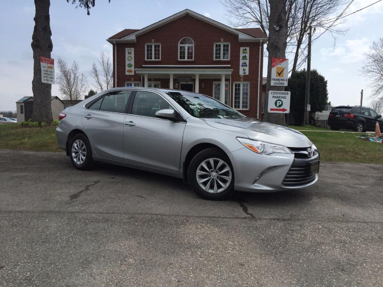 <p>This 2016 Toyota Camry LE has a CLEAN CARPROOF and comes niceqly equipped with a REAR BACKUP CAMERA, BLUETOOTH, WOODGRAIN INTERIOR TRIM, STEERING WHEEL AUDIO CONTROLS, AUX connectivity for your IPOD/IPHONE or ANDROID music playing device and much more. WONT LAST LONG. This vehicle has been previously used as a daily rental. Call 1-519-686-7253 or Visit 443 Exeter Rd. That Car Place.</p>
<ul>
<li class=li1><span class=s2>Voted&nbsp;<strong><em>#1 Best Used Car Dealership</em></strong>&nbsp;through 2014 - 2017 in London, Ontario</span></li>
<li class=li1><span class=s2>Voted&nbsp;<strong><em>Top Choice Award</em></strong>&nbsp;in 2015, 2016 & 2017</span></li>
<li class=li1><span class=s2>Voted&nbsp;<strong><em>London&rsquo;s Readers&rsquo; Choice Award</em></strong>&nbsp;2014 and 2015&nbsp;</span></li>
<li class=li1><span class=s2><strong><em>A+</em></strong><strong><em>Better Business Bureau rating</em></strong></span></li>
<li class=li1><span class=s2>We have been in business for&nbsp;</span><span class=s4><strong>27yrs</strong></span><span class=s2><strong><em>&nbsp;</em></strong></span></li>
<li class=li1><span class=s2>Most liked used car dealer on social media in Canada</span></li>
<li class=li1><span class=s2>We use an exclusive 3rd party tool that accurately monitors vehicle prices to guarantee our customers get the best value.&nbsp;</span></li>
<li class=li1><span class=s2><strong><em>NO NEED FOR HAGGLING!&nbsp;</em></strong></span></li>
<li class=li1><span class=s2><strong><em>NO HIDDEN ADMIN. FEES!</em></strong></span></li>
<li class=li1><span class=s2><strong><em>Just honesty and integrity at no additional charge</em></strong></span></li>
<li class=li1><span class=s2>All vehicles:</span></li>
<ul>
<li class=li1><span class=s2>Go through Safety inspection with 30 days 100% safety related items warranty completed by us</span></li>
<li class=li1><span class=s2>With below 50% brakes will be replaced&nbsp;</span></li>
<li class=li1><span class=s2>Receive a semi-synthetic oil-lube-filter</span></li>
<li class=li1><span class=s2>Undergo Emissions test and an extensive inspection</span></li>
<li class=li1><span class=s2>Include a FREE CarProof Report</span></li>
<li class=li2><span class=s2>Purchased include FREE cleanup and detailing</span></li>
</ul>
<li class=li2><span class=s2>Our&nbsp;<em>Finance Specialists</em>&nbsp;will do their best to:</span></li>
<ul>
<li class=li2><span class=s2>Provide&nbsp;<strong><em>SAME-DAY APPROVALS</em></strong></span></li>
<li class=li2><span class=s2>Ensure achieving the&nbsp;<strong><em>LOWEST INTEREST RATE &</em></strong>&nbsp;<strong><em>BEST TERMS&nbsp;</em></strong>possible</span></li>
<li class=li2><span class=s2>Provide&nbsp;<strong><em>FULLY OPEN-END LOANS *pay them off any time with no penalty*</em></strong></span></li>
</ul>
<li class=li3><span class=s2>Whether its good, bad or no credit, bankruptcy, proposal, divorce or repossessions. $0 down Apply securely with confidence at&nbsp;<a href=http://bit.ly/2cg4WeM><span class=s5>http://bit.ly/2cg4WeM</span></a></span><span class=s6>&nbsp;</span></li>
<li class=li3><span class=s2>We make the buying process SIMPLE and STRESS-FREE, our reviews speak for themselves:</span></li>
<ul>
<li class=li4><span class=s8><strong><em>Google</em></strong><em>:</em></span><span class=s9><a href=http://bit.ly/2cK4fi3><span class=s10>http://bit.ly/2cK4fi3</span></a></span></li>
<li class=li5><span class=s8><strong><em>DealerRater:</em></strong></span><span class=s12><a href=http://bit.ly/2cIdFI1><span class=s5>http://bit.ly/2cIdFI1</span></a></span></li>
<li class=li5><span class=s8><strong><em>N49.com:</em></strong></span><span class=s12><a href=http://bit.ly/2bYZlOh><span class=s5>http://bit.ly/2bYZlOh</span></a></span></li>
<li class=li5><span class=s8><strong><em>BBB:</em></strong></span><span class=s9>&nbsp;<a href=http://go.bbb.org/2cK5Cxd><span class=s5>http://go.bbb.org/2cK5Cxd</span></a></span></li>
</ul>
</ul>
<p>&nbsp;**Payments are based off qualifying monthly term $0 down & 4.9% interest. Qualifying term and rate of borrowing varies by lender. Example: The cost of borrowing on a vehicle with a purchase price of $10000 at 4.9% over 60 month term is $1499.78. Rates are subject to change without notice.&nbsp;</p>