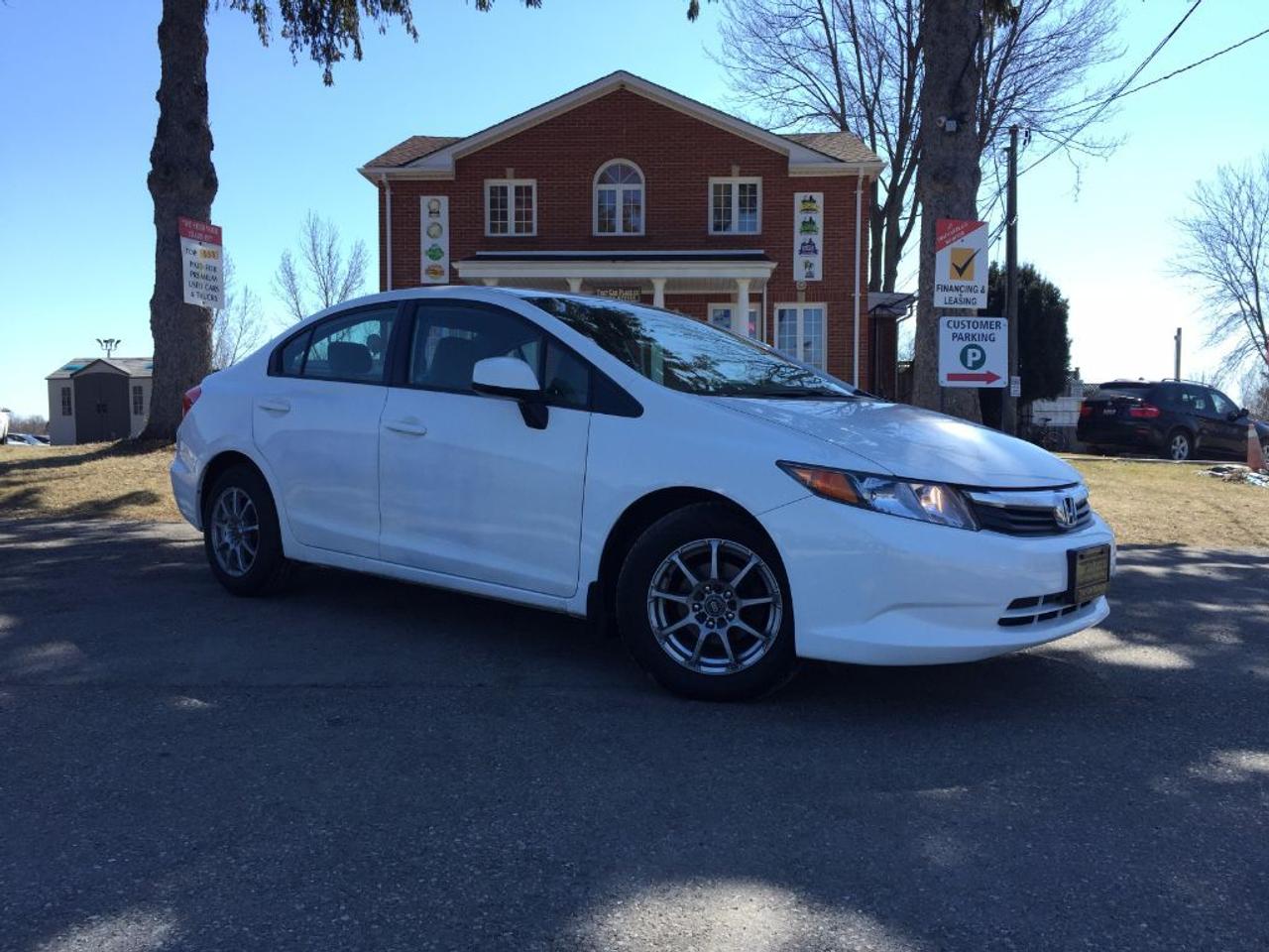 <p>This 2012 Honda Civic LX WONT LAST LONG!!! Comes with AUX/CD/MP3 connectivity for your IPOD/IPHONE or ANDROID music playing device, Emergency Trunk Release, Brake Assist, is Fuel Efficient and includes many more features. Call 1-519-686-7253 or Visit 443 Exeter Rd. That Car Place!</p>
<ul>
<li class=li1><span class=s2>Voted&nbsp;<strong><em>#1 Best Used Car Dealership</em></strong>&nbsp;through 2014 - 2017 (4 yrs) in London, Ontario</span></li>
<li class=li1><span class=s2>Voted&nbsp;<strong><em>Top Choice Award</em></strong>&nbsp;in 2015 - 2017 (3 yrs)</span></li>
<li class=li1><span class=s2>Voted&nbsp;<strong><em>London&rsquo;s Readers&rsquo; Choice Award</em></strong>&nbsp;2014 and 2015&nbsp;</span></li>
<li class=li1><span class=s2><strong><em>A+</em></strong><strong><em>Better Business Bureau rating</em></strong></span></li>
<li class=li1><span class=s2>We have been in business for&nbsp;</span><span class=s4><strong>27yrs</strong></span><span class=s2><strong><em>&nbsp;</em></strong></span></li>
<li class=li1><span class=s2>Most liked used car dealer on social media in Canada</span></li>
<li class=li1><span class=s2>We use an exclusive 3rd party tool that accurately monitors vehicle prices to guarantee our customers get the best value.&nbsp;</span></li>
<li class=li1><span class=s2><strong><em>NO NEED FOR HAGGLING!&nbsp;</em></strong></span></li>
<li class=li1><span class=s2><strong><em>NO HIDDEN ADMIN. FEES!</em></strong></span></li>
<li class=li1><span class=s2><strong><em>Just honesty and integrity at no additional charge</em></strong></span></li>
<li class=li1><span class=s2>All vehicles:</span></li>
<ul>
<li class=li1><span class=s2>Go through Safety inspection with 30 days 100% safety related items warranty completed by us</span></li>
<li class=li1><span class=s2>With below 50% brakes will be replaced&nbsp;</span></li>
<li class=li1><span class=s2>Receive a semi-synthetic oil-lube-filter</span></li>
<li class=li1><span class=s2>Undergo Emissions test and an extensive inspection</span></li>
<li class=li1><span class=s2>Include a FREE CarProof Report</span></li>
<li class=li2><span class=s2>Purchased include FREE cleanup and detailing</span></li>
</ul>
<li class=li2><span class=s2>Our&nbsp;<em>Finance Specialists</em>&nbsp;will do their best to:</span></li>
<ul>
<li class=li2><span class=s2>Provide&nbsp;<strong><em>SAME-DAY APPROVALS</em></strong></span></li>
<li class=li2><span class=s2>Ensure achieving the&nbsp;<strong><em>LOWEST INTEREST RATE &</em></strong>&nbsp;<strong><em>BEST TERMS&nbsp;</em></strong>possible</span></li>
<li class=li2><span class=s2>Provide&nbsp;<strong><em>FULLY OPEN-END LOANS *pay them off any time with no penalty*</em></strong></span></li>
</ul>
<li class=li3><span class=s2>Whether its good, bad or no credit, bankruptcy, proposal, divorce or repossessions. $0 down Apply securely with confidence at&nbsp;<a href=http://bit.ly/2cg4WeM><span class=s5>http://bit.ly/2cg4WeM</span></a></span><span class=s6>&nbsp;</span></li>
<li class=li3><span class=s2>We make the buying process SIMPLE and STRESS-FREE, our reviews speak for themselves:</span></li>
<ul>
<li class=li4><span class=s8><strong><em>Google</em></strong><em>:</em></span><span class=s9><a href=http://bit.ly/2cK4fi3><span class=s10>http://bit.ly/2cK4fi3</span></a></span></li>
<li class=li5><span class=s8><strong><em>DealerRater:</em></strong></span><span class=s12><span class=s5><a href=http://bit.ly/2cIdFI1>http://bit.ly/2cIdFI1</a></span></span></li>
<li class=li5><em><strong>Reviewsii:</strong></em><a style=text-indent: -18pt; href=http://bit.ly/2ot45Ar>http://bit.ly/2ot45Ar</a><span style=text-indent: -18pt;>&nbsp;&nbsp;</span></li>
<li class=li5><span class=s8><strong><em>BBB:</em></strong></span><span class=s9>&nbsp;<a href=http://go.bbb.org/2cK5Cxd><span class=s5>http://go.bbb.org/2cK5Cxd</span></a></span></li>
</ul>
</ul>
<p>&nbsp;**Payments are based off qualifying monthly term $0 down & 4.9% interest. Qualifying term and rate of borrowing varies by lender. Example: The cost of borrowing on a vehicle with a purchase price of $10000 at 4.9% over 60 month term is $1499.78. Rates are subject to change without notice.&nbsp;</p>