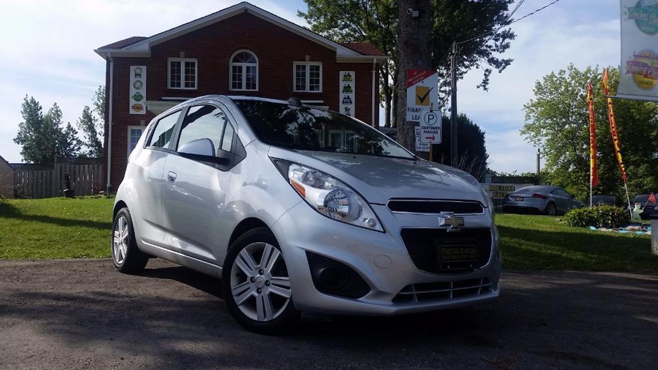 <p>This 2015 Chevy Spark LT comes loaded with its own WIFI HOTSPOT, BLUETOOTH, USB/AUX/CD/MP3 connectivity for your IPOD/IPHONE or ANDROID music playing device, ONSTAR, Satellite Radio, Aluminum Wheels, Steering Wheel Audio Controls PLUS MORE! This car can be yours for ONLY $40/Week OAC. This vehicle was previously used as a daily rental. Call 1-519-686-7253 or Visit 443 Exeter Rd. That Car Place.</p>
<ul>
<li class=li1><span class=s2>Voted&nbsp;<strong><em>#1 Best Used Car Dealership</em></strong>&nbsp;through 2014 - 2017 (4 yrs) in London, Ontario</span></li>
<li class=li1><span class=s2>Voted&nbsp;<strong><em>Top Choice Award</em></strong>&nbsp;in 2015 - 2017 (3 yrs)</span></li>
<li class=li1><span class=s2>Voted&nbsp;<strong><em>London&rsquo;s Readers&rsquo; Choice Award</em></strong>&nbsp;2014 and 2015&nbsp;</span></li>
<li class=li1><span class=s2><strong><em>A+</em></strong><strong><em>Better Business Bureau rating</em></strong></span></li>
<li class=li1><span class=s2>We have been in business for&nbsp;</span><span class=s4><strong>27yrs</strong></span><span class=s2><strong><em>&nbsp;</em></strong></span></li>
<li class=li1><span class=s2>Most liked used car dealer on social media in Canada</span></li>
<li class=li1><span class=s2>We use an exclusive 3rd party tool that accurately monitors vehicle prices to guarantee our customers get the best value.&nbsp;</span></li>
<li class=li1><span class=s2><strong><em>NO NEED FOR HAGGLING!&nbsp;</em></strong></span></li>
<li class=li1><span class=s2><strong><em>NO HIDDEN ADMIN. FEES!</em></strong></span></li>
<li class=li1><span class=s2><strong><em>Just honesty and integrity at no additional charge</em></strong></span></li>
<li class=li1><span class=s2>All vehicles:</span></li>
<ul>
<li class=li1><span class=s2>Go through Safety inspection with 30 days 100% safety related items warranty completed by us</span></li>
<li class=li1><span class=s2>With below 50% brakes will be replaced&nbsp;</span></li>
<li class=li1><span class=s2>Receive a semi-synthetic oil-lube-filter</span></li>
<li class=li1><span class=s2>Undergo Emissions test and an extensive inspection</span></li>
<li class=li1><span class=s2>Include a FREE CarProof Report</span></li>
<li class=li2><span class=s2>Purchased include FREE cleanup and detailing</span></li>
</ul>
<li class=li2><span class=s2>Our&nbsp;<em>Finance Specialists</em>&nbsp;will do their best to:</span></li>
<ul>
<li class=li2><span class=s2>Provide&nbsp;<strong><em>SAME-DAY APPROVALS</em></strong></span></li>
<li class=li2><span class=s2>Ensure achieving the&nbsp;<strong><em>LOWEST INTEREST RATE &</em></strong>&nbsp;<strong><em>BEST TERMS&nbsp;</em></strong>possible</span></li>
<li class=li2><span class=s2>Provide&nbsp;<strong><em>FULLY OPEN-END LOANS *pay them off any time with no penalty*</em></strong></span></li>
</ul>
<li class=li3><span class=s2>Whether its good, bad or no credit, bankruptcy, proposal, divorce or repossessions. $0 down Apply securely with confidence at&nbsp;<a href=http://bit.ly/2cg4WeM><span class=s5>http://bit.ly/2cg4WeM</span></a></span><span class=s6>&nbsp;</span></li>
<li class=li3><span class=s2>We make the buying process SIMPLE and STRESS-FREE, our reviews speak for themselves:</span></li>
<ul>
<li class=li4><span class=s8><strong><em>Google</em></strong><em>:</em></span><span class=s9><a href=http://bit.ly/2cK4fi3><span class=s10>http://bit.ly/2cK4fi3</span></a></span></li>
<li class=li5><span class=s8><strong><em>DealerRater:</em></strong></span><span class=s12><span class=s5><a href=http://bit.ly/2cIdFI1>http://bit.ly/2cIdFI1</a></span></span></li>
<li class=li5><em><strong>Reviewsii:</strong></em><a style=text-indent: -18pt; href=http://bit.ly/2ot45Ar>http://bit.ly/2ot45Ar</a><span style=text-indent: -18pt;>&nbsp;&nbsp;</span></li>
<li class=li5><span class=s8><strong><em>BBB:</em></strong></span><span class=s9>&nbsp;<a href=http://go.bbb.org/2cK5Cxd><span class=s5>http://go.bbb.org/2cK5Cxd</span></a></span></li>
</ul>
</ul>
<p>&nbsp;**Payments are based off qualifying monthly term $0 down & 4.9% interest. Qualifying term and rate of borrowing varies by lender. Example: The cost of borrowing on a vehicle with a purchase price of $10000 at 4.9% over 60 month term is $1499.78. Rates are subject to change without notice.&nbsp;</p>