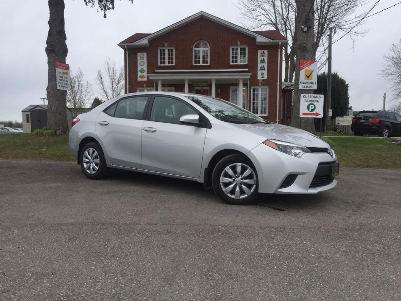 <p>This 2014 Toyota Corolla LE is loaded and has a CLEAN CARPROOF. Comes with REAR CAMERA, HEATED SEATS, BLUETOOTH, AUX connectivity for your IPOD/IPHONE or ANDROID music playing device and more. WONT LAST LONG!!! Call 1-519-686-7253 or Visit 443 Exeter Rd. That Car Place</p>
<ul>
<li class=li1><span class=s2>Voted&nbsp;<strong><em>#1 Best Used Car Dealership</em></strong>&nbsp;through 2014 - 2017 in London, Ontario</span></li>
<li class=li1><span class=s2>Voted&nbsp;<strong><em>Top Choice Award</em></strong>&nbsp;in 2015, 2016 & 2017</span></li>
<li class=li1><span class=s2>Voted&nbsp;<strong><em>London&rsquo;s Readers&rsquo; Choice Award</em></strong>&nbsp;2014 and 2015&nbsp;</span></li>
<li class=li1><span class=s2><strong><em>A+</em></strong><strong><em>Better Business Bureau rating</em></strong></span></li>
<li class=li1><span class=s2>We have been in business for&nbsp;</span><span class=s4><strong>27yrs</strong></span><span class=s2><strong><em>&nbsp;</em></strong></span></li>
<li class=li1><span class=s2>Most liked used car dealer on social media in Canada</span></li>
<li class=li1><span class=s2>We use an exclusive 3rd party tool that accurately monitors vehicle prices to guarantee our customers get the best value.&nbsp;</span></li>
<li class=li1><span class=s2><strong><em>NO NEED FOR HAGGLING!&nbsp;</em></strong></span></li>
<li class=li1><span class=s2><strong><em>NO HIDDEN ADMIN. FEES!</em></strong></span></li>
<li class=li1><span class=s2><strong><em>Just honesty and integrity at no additional charge</em></strong></span></li>
<li class=li1><span class=s2>All vehicles:</span></li>
<ul>
<li class=li1><span class=s2>Go through Safety inspection with 30 days 100% safety related items warranty completed by us</span></li>
<li class=li1><span class=s2>With below 50% brakes will be replaced&nbsp;</span></li>
<li class=li1><span class=s2>Receive a semi-synthetic oil-lube-filter</span></li>
<li class=li1><span class=s2>Undergo Emissions test and an extensive inspection</span></li>
<li class=li1><span class=s2>Include a FREE CarProof Report</span></li>
<li class=li2><span class=s2>Purchased include FREE cleanup and detailing</span></li>
</ul>
<li class=li2><span class=s2>Our&nbsp;<em>Finance Specialists</em>&nbsp;will do their best to:</span></li>
<ul>
<li class=li2><span class=s2>Provide&nbsp;<strong><em>SAME-DAY APPROVALS</em></strong></span></li>
<li class=li2><span class=s2>Ensure achieving the&nbsp;<strong><em>LOWEST INTEREST RATE &</em></strong>&nbsp;<strong><em>BEST TERMS&nbsp;</em></strong>possible</span></li>
<li class=li2><span class=s2>Provide&nbsp;<strong><em>FULLY OPEN-END LOANS *pay them off any time with no penalty*</em></strong></span></li>
</ul>
<li class=li3><span class=s2>Whether its good, bad or no credit, bankruptcy, proposal, divorce or repossessions. $0 down Apply securely with confidence at&nbsp;<a href=http://bit.ly/2cg4WeM><span class=s5>http://bit.ly/2cg4WeM</span></a></span><span class=s6>&nbsp;</span></li>
<li class=li3><span class=s2>We make the buying process SIMPLE and STRESS-FREE, our reviews speak for themselves:</span></li>
<ul>
<li class=li4><span class=s8><strong><em>Google</em></strong><em>:</em></span><span class=s9><a href=http://bit.ly/2cK4fi3><span class=s10>http://bit.ly/2cK4fi3</span></a></span></li>
<li class=li5><span class=s8><strong><em>DealerRater:</em></strong></span><span class=s12><a href=http://bit.ly/2cIdFI1><span class=s5>http://bit.ly/2cIdFI1</span></a></span></li>
<li class=li5><span class=s8><strong><em>N49.com:</em></strong></span><span class=s12><a href=http://bit.ly/2bYZlOh><span class=s5>http://bit.ly/2bYZlOh</span></a></span></li>
<li class=li5><span class=s8><strong><em>BBB:</em></strong></span><span class=s9>&nbsp;<a href=http://go.bbb.org/2cK5Cxd><span class=s5>http://go.bbb.org/2cK5Cxd</span></a></span></li>
</ul>
</ul>
<p>&nbsp;**Payments are based off qualifying monthly term $0 down & 4.9% interest. Qualifying term and rate of borrowing varies by lender. Example: The cost of borrowing on a vehicle with a purchase price of $10000 at 4.9% over 60 month term is $1499.78. Rates are subject to change without notice.&nbsp;</p>