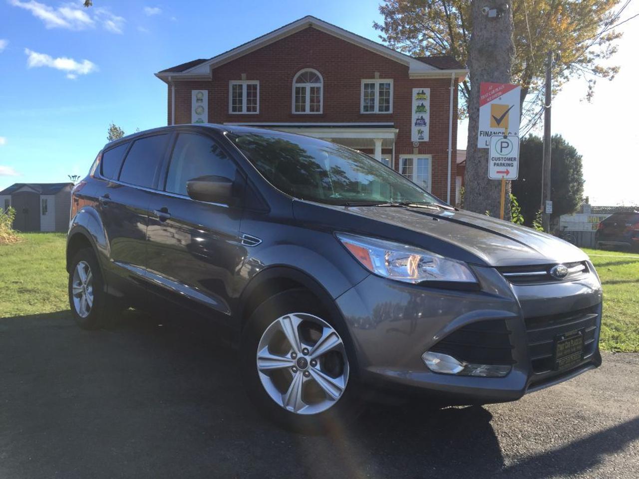 <p>This 2014 Ford Escape SE is LOADED!!! Comes with BLUETOOTH, REAR BACKUP CAMERA, USB/AUX/CD/MP3 connectivity for your IPOD/IPHONE or ANDROID music playing device, HEATED FRONT ROW SEATS, Spacious Interior, Tinted Windows and many more awesome features. Call 1-519-686-7253 or Visit 443 Exeter Rd. That Car Place.&nbsp;</p>
<ul>
<li class=li1><span class=s2>Voted&nbsp;<strong><em>#1 Best Used Car Dealership</em></strong>&nbsp;through 2014 - 2017 (4 yrs) in London, Ontario</span></li>
<li class=li1><span class=s2>Voted&nbsp;<strong><em>Top Choice Award</em></strong>&nbsp;in 2015 - 2017 (3 yrs)</span></li>
<li class=li1><span class=s2>Voted&nbsp;<strong><em>London&rsquo;s Readers&rsquo; Choice Award</em></strong>&nbsp;2014 and 2015&nbsp;</span></li>
<li class=li1><span class=s2><strong><em>A+</em></strong><strong><em>Better Business Bureau rating</em></strong></span></li>
<li class=li1><span class=s2>We have been in business for&nbsp;</span><span class=s4><strong>27yrs</strong></span><span class=s2><strong><em>&nbsp;</em></strong></span></li>
<li class=li1><span class=s2>Most liked used car dealer on social media in Canada</span></li>
<li class=li1><span class=s2>We use an exclusive 3rd party tool that accurately monitors vehicle prices to guarantee our customers get the best value.&nbsp;</span></li>
<li class=li1><span class=s2><strong><em>NO NEED FOR HAGGLING!&nbsp;</em></strong></span></li>
<li class=li1><span class=s2><strong><em>NO HIDDEN ADMIN. FEES!</em></strong></span></li>
<li class=li1><span class=s2><strong><em>Just honesty and integrity at no additional charge</em></strong></span></li>
<li class=li1><span class=s2>All vehicles:</span></li>
<ul>
<li class=li1><span class=s2>Go through Safety inspection with 30 days 100% safety related items warranty completed by us</span></li>
<li class=li1><span class=s2>With below 50% brakes will be replaced&nbsp;</span></li>
<li class=li1><span class=s2>Receive a semi-synthetic oil-lube-filter</span></li>
<li class=li1><span class=s2>Undergo Emissions test and an extensive inspection</span></li>
<li class=li1><span class=s2>Include a FREE CarProof Report</span></li>
<li class=li2><span class=s2>Purchased include FREE cleanup and detailing</span></li>
</ul>
<li class=li2><span class=s2>Our&nbsp;<em>Finance Specialists</em>&nbsp;will do their best to:</span></li>
<ul>
<li class=li2><span class=s2>Provide&nbsp;<strong><em>SAME-DAY APPROVALS</em></strong></span></li>
<li class=li2><span class=s2>Ensure achieving the&nbsp;<strong><em>LOWEST INTEREST RATE &</em></strong>&nbsp;<strong><em>BEST TERMS&nbsp;</em></strong>possible</span></li>
<li class=li2><span class=s2>Provide&nbsp;<strong><em>FULLY OPEN-END LOANS *pay them off any time with no penalty*</em></strong></span></li>
</ul>
<li class=li3><span class=s2>Whether its good, bad or no credit, bankruptcy, proposal, divorce or repossessions. $0 down Apply securely with confidence at&nbsp;<a href=http://bit.ly/2cg4WeM><span class=s5>http://bit.ly/2cg4WeM</span></a></span><span class=s6>&nbsp;</span></li>
<li class=li3><span class=s2>We make the buying process SIMPLE and STRESS-FREE, our reviews speak for themselves:</span></li>
<ul>
<li class=li4><span class=s8><strong><em>Google</em></strong><em>:</em></span><span class=s9><a href=http://bit.ly/2cK4fi3><span class=s10>http://bit.ly/2cK4fi3</span></a></span></li>
<li class=li5><span class=s8><strong><em>DealerRater:</em></strong></span><span class=s12><span class=s5><a href=http://bit.ly/2cIdFI1>http://bit.ly/2cIdFI1</a></span></span></li>
<li class=li5><em><strong>Reviewsii:</strong></em><a style=text-indent: -18pt; href=http://bit.ly/2ot45Ar>http://bit.ly/2ot45Ar</a><span style=text-indent: -18pt;>&nbsp;&nbsp;</span></li>
<li class=li5><span class=s8><strong><em>BBB:</em></strong></span><span class=s9>&nbsp;<a href=http://go.bbb.org/2cK5Cxd><span class=s5>http://go.bbb.org/2cK5Cxd</span></a></span></li>
</ul>
</ul>
<p>&nbsp;**Payments are based off qualifying monthly term $0 down & 4.9% interest. Qualifying term and rate of borrowing varies by lender. Example: The cost of borrowing on a vehicle with a purchase price of $10000 at 4.9% over 60 month term is $1499.78. Rates are subject to change without notice.&nbsp;</p>