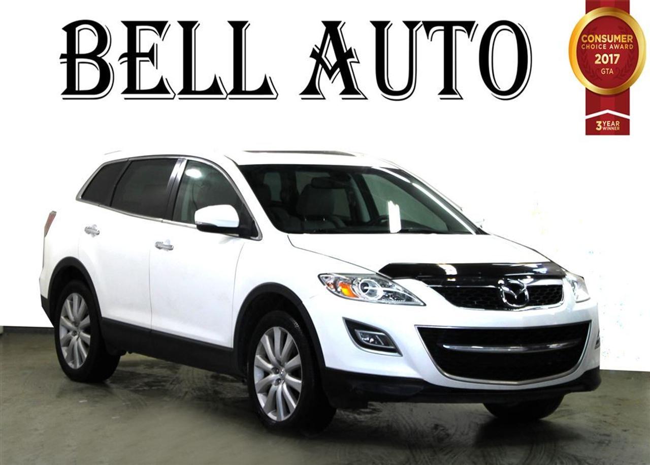 Get excited about the 2010 Mazda CX-9! Youll appreciate its safety and convenience features! This vehicle has achieved Certified Pre-Owned status, by passing a comprehensive certification process, including a rigorous 150 point inspection! This model accommodates 7 passengers comfortably, and provides features such as: variably intermittent wipers, cruise control, and a blind spot monitoring system. Under the hood youll find a 6 cylinder engine with more than 270 horsepower, and for added security, dynamic Stability Control supplements the drivetrain. All wheel drive maintains traction at all four corners. We have a skilled and knowledgeable sales staff with many years of experience satisfying our customers needs. Wed be happy to answer any questions that you may have. We are here to help you. All vehicles can be Safety Standards Certificate for an additional $399, if no Safety Standards Certificate then as per OMVIC Regulations the vehicle is deemed to be not drivable, no Safety Standards Certificate
