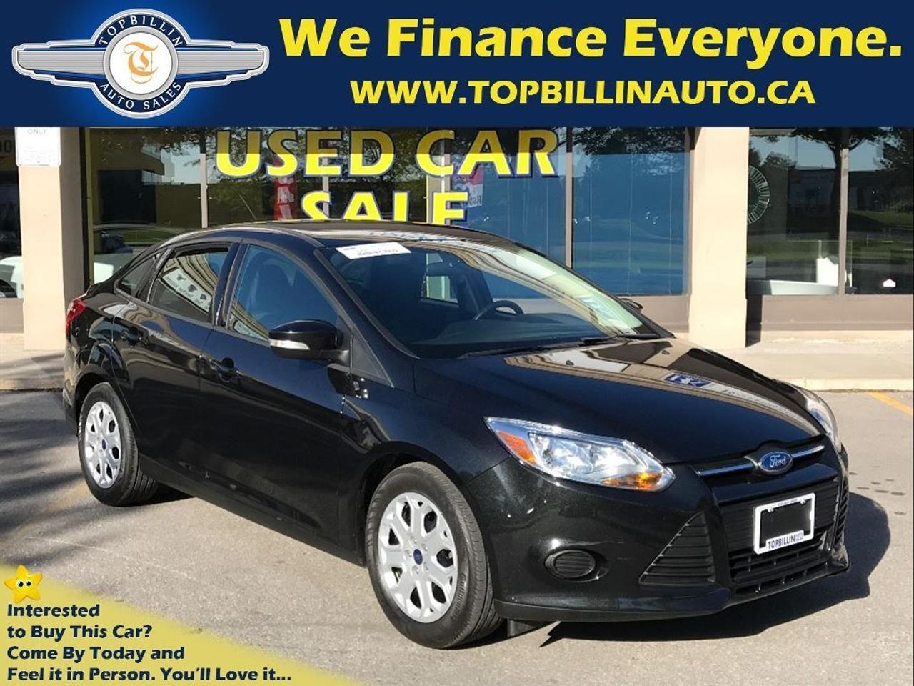 Local Ontario Ford Focus SE from Ford Canada. CLEAN CARPROOF - ACCIDENT FREE. The same body style as the 2012 & 2014 models. This 2013 Ford Focus is Fully equipped with options like Automatic Transmission, Microsoft Sync, BLUETOOTH, AUX Input, USB ,Cruise Control, Heated Seats, Power Windows & more. Extra Clean inside and out! This Ford Focus comes with Free 2 Years Power-train Warranty included in the price and No Extra Cost. Used Car Loan, Financing, Leasing for Company or Personal use is available at the LOWEST possible rate! OAC. This Ford Focus is Great on Gas, Cheap on insurance.  **Haggle Free**Hassel Free**fair Pricing**  ------------------------------------------------------------------------------------------------------------------   Discover your Exclusive used car loan offer with Easy financing application and a proven way to save money. We offer used car loans for everyone! Good credit car loans, Bad Credit Car loans, No credit car loans, Newcomers to Canada car loans & used car leasing. Used car loan rates start at %4.9, Do Not pay up to 90 days OAC. Apply Today! Secure, No obligation, you will love the results. www.topbillinauto.ca   Cost of borrowing $10,000 @ %4.9 over 60M is $1,300  ------------------------------------------------------------------------------------------------------------------   WE FINANCE EVERYONE. 100% APPLICATIONS ACCEPTED. Apply Today, Drive Tomorrow! WE CAN HELP!   ------------------------------------------------------------------------------------------------------------------  FREE 2 YEARS WARRANTY INCLUDES UNLIMITED KILOMETERS, $600 PER CLAIM, COVERS (ENGINE, TRANSMISSION, DIFFERENTIAL, HEAD GASKET & ETC.) CANADA WIDE. Warranty Upgrade is Available. AS PER OMVIC REGULATION STANDARDS  VEHICLE IS NOT DERIVABLE, NOT CERTIFIED AND NOT E-TESTED. CERTIFICATION AND E-TEST AVAILABLE FOR FIVE HUNDREDS AND NINETY FIVE DOLLARS. THIS VEHICLE WILL BE DRIVABLE AFTER CERTIFICATION IS DONE!!! YOU DON&rsquo;T HAVE TO PAY FOR SAFETY CERTIFICATE, YOU CAN SAFETY THROUGH YOUR OWN MECHANIC. SOME VEHICLES MAY COME WITH VALID E-TEST!!! TO LEARN MORE ABOUT THIS RULE PLEASE CONTACT DEALER. TOPBILLIN AUTO SALES serving customers from all over Ontario including: GTA, Toronto, Scarborough, Mississauga, Vaughan, Richmond Hill, Markham, Oshawa, Pickering, Ajax, Whitby, Hamilton, Burlington, Brampton, Kitchener, Waterloo, Milton, Oakville, Newmarket, Aurora, Barrie and London. FOR ALL PROMOS AND FINANCING SOME RESTRICTIONS MAY APPLY. Cant you find your desired vehicle in our inventory? NO Problem! We find your ideal vehicle. Call us today!  ------------------------------------------------------------------------------------------------------------------   We sell and ship cars across Canada & the USA at the lowest possible cost, delivered to your door.   ------------------------------------------------------------------------------------------------------------------  Indoor Showroom Location: 7855 KEELE ST, VAUGHAN, ON, L4K1Y6 (JUST NORTH OF HWY7 ON KEELE ST.) BUSINESS HOURS: Mon-Fri 9:30 AM to 7:30 PM, Saturday 10 AM to 5 PM, Sunday 12 PM to 4 PM