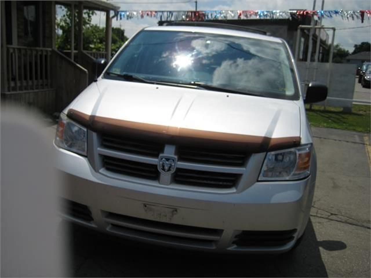 Take The Whole Family As Well As The Luggage On An Excellent Roomy, Comfortable And Dependable Caravan. This Vehicle Has Features Such As:Fold Away Seating, Swivel Chairs With Table,  Back Up Camera, DVD, Satellite Radio Sirius,  Power Locks, Power Windows, Power Mirrors, Air Conditioning, Cruise Control, MP3 Capability, AM/FM/CD, USB Input, Roof Luggage Rack.. Comes Certified. Price + HST + Lic. Fees. Financing Available. Good Or Bad Credit.
We Also Sell New & Used Tires. Over 4000 Tires In Stock. Sold In Sets, Pairs & Singles.